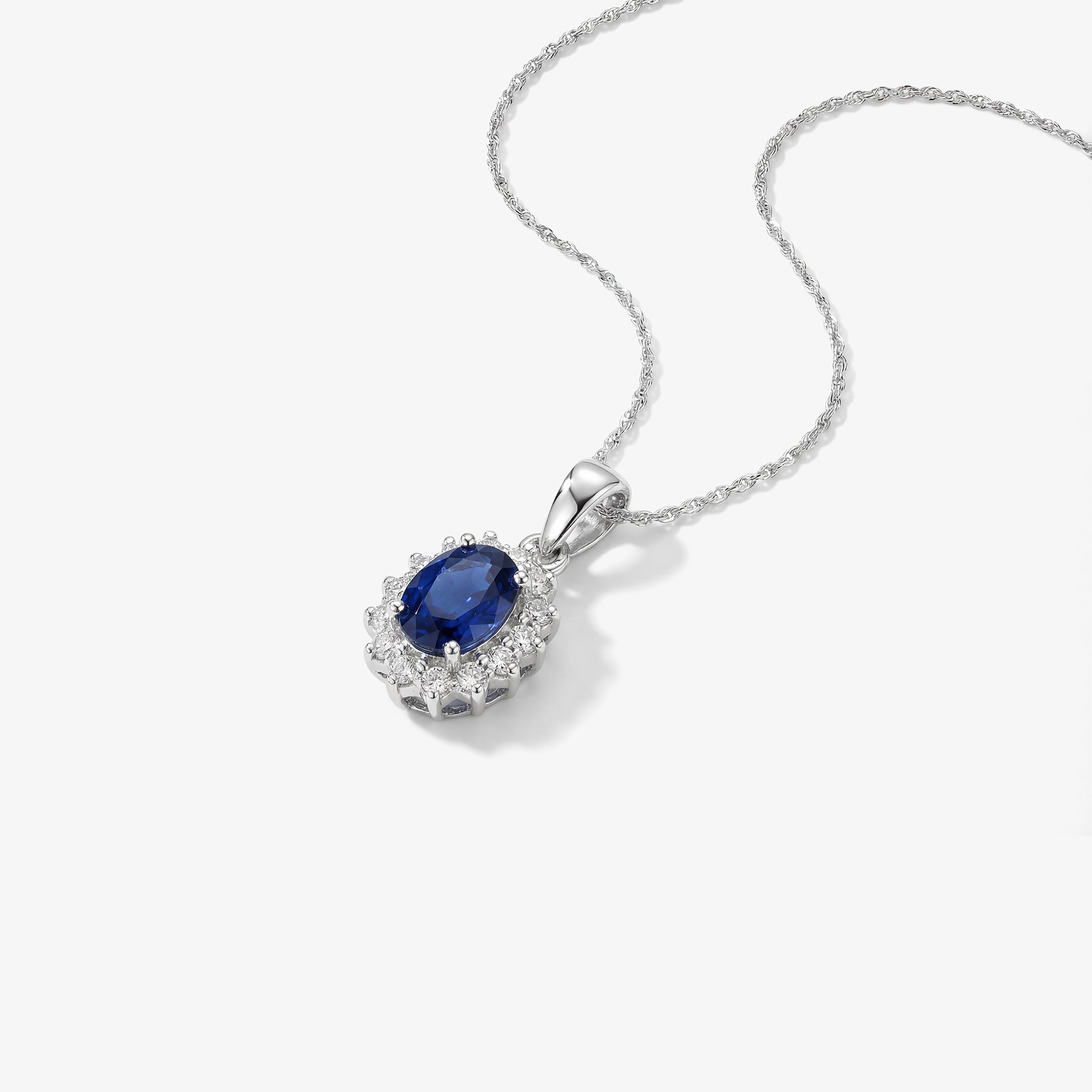 0.62ct Natural Blue Sapphire and Diamond Halo Pendant in 14K White Gold - JewelryAndStore