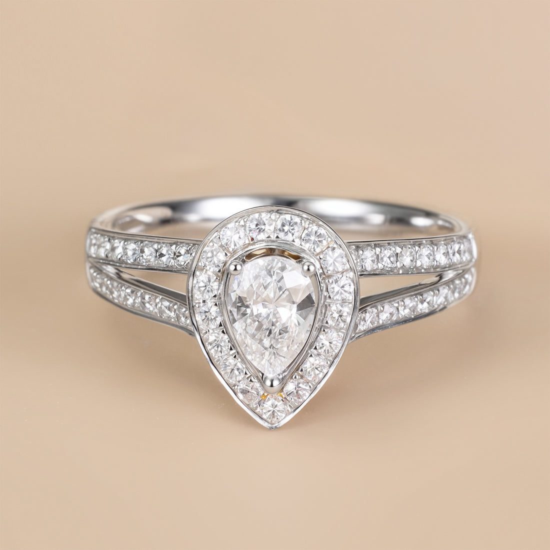 0.69ct.tw. Pear - Shaped Diamond Halo Engagement Ring in 18K White Gold - Jewelry And Store