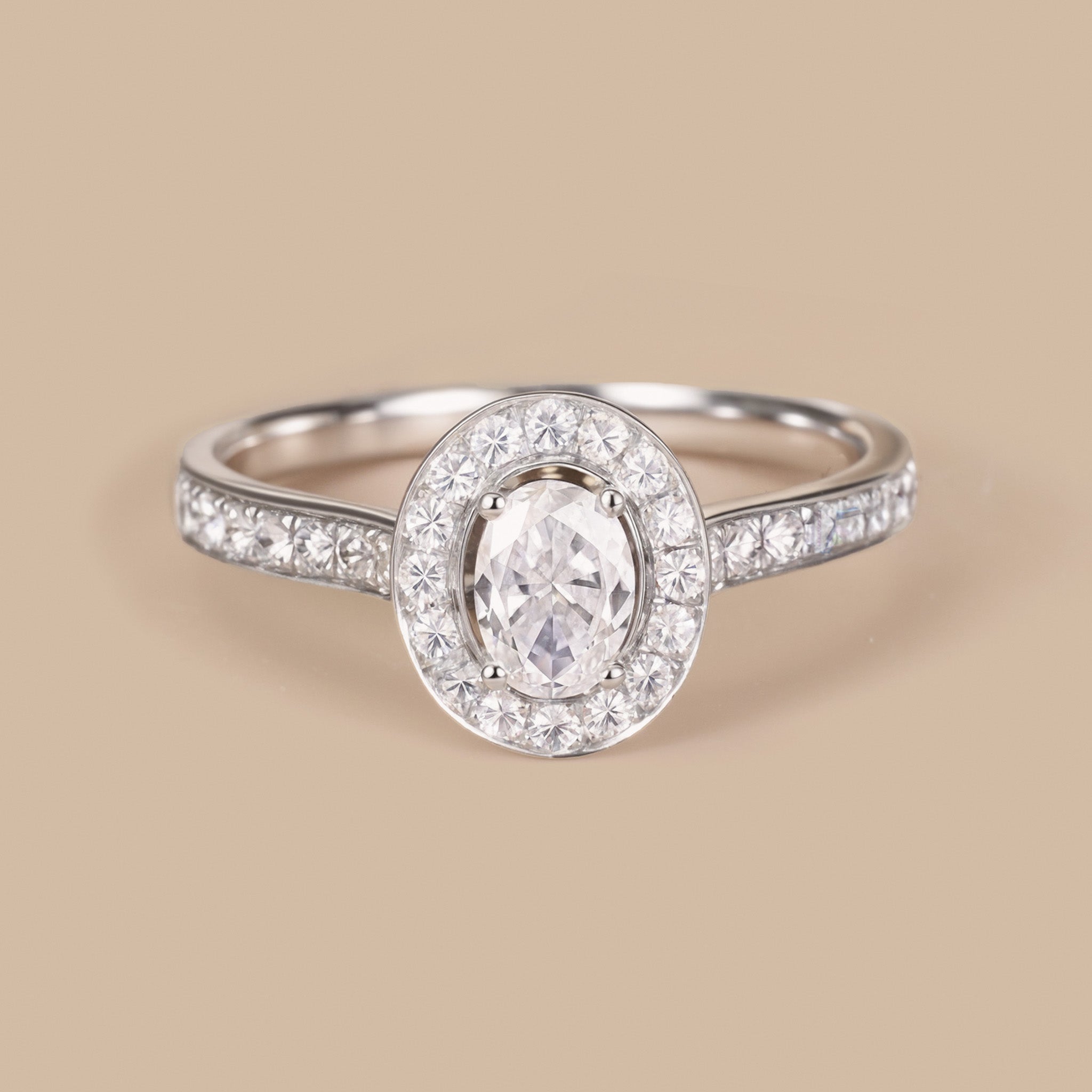 0.69ct.tw. Oval Diamond Halo Engagement Ring in 18K White Gold - Jewelry And Store