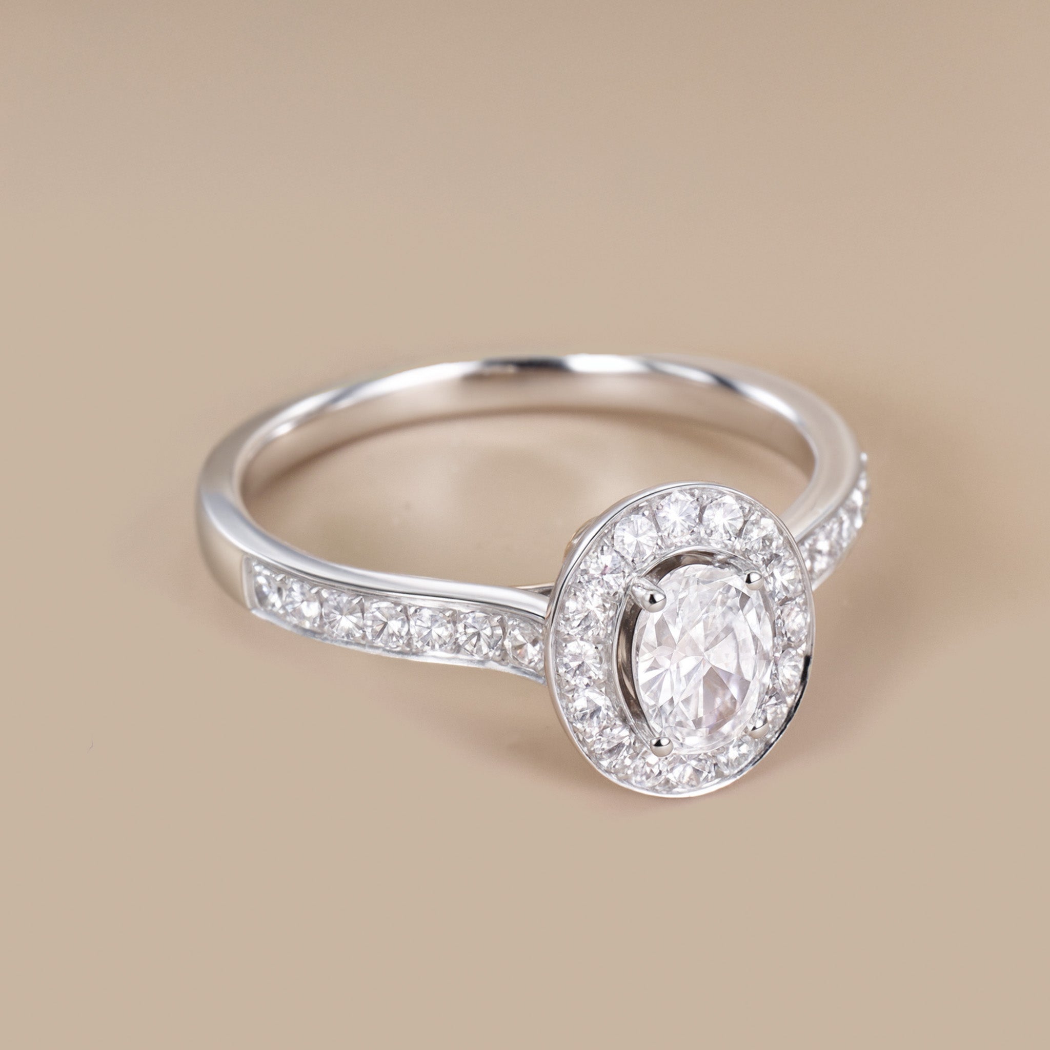 0.69ct.tw. Oval Diamond Halo Engagement Ring in 18K White Gold - Jewelry And Store