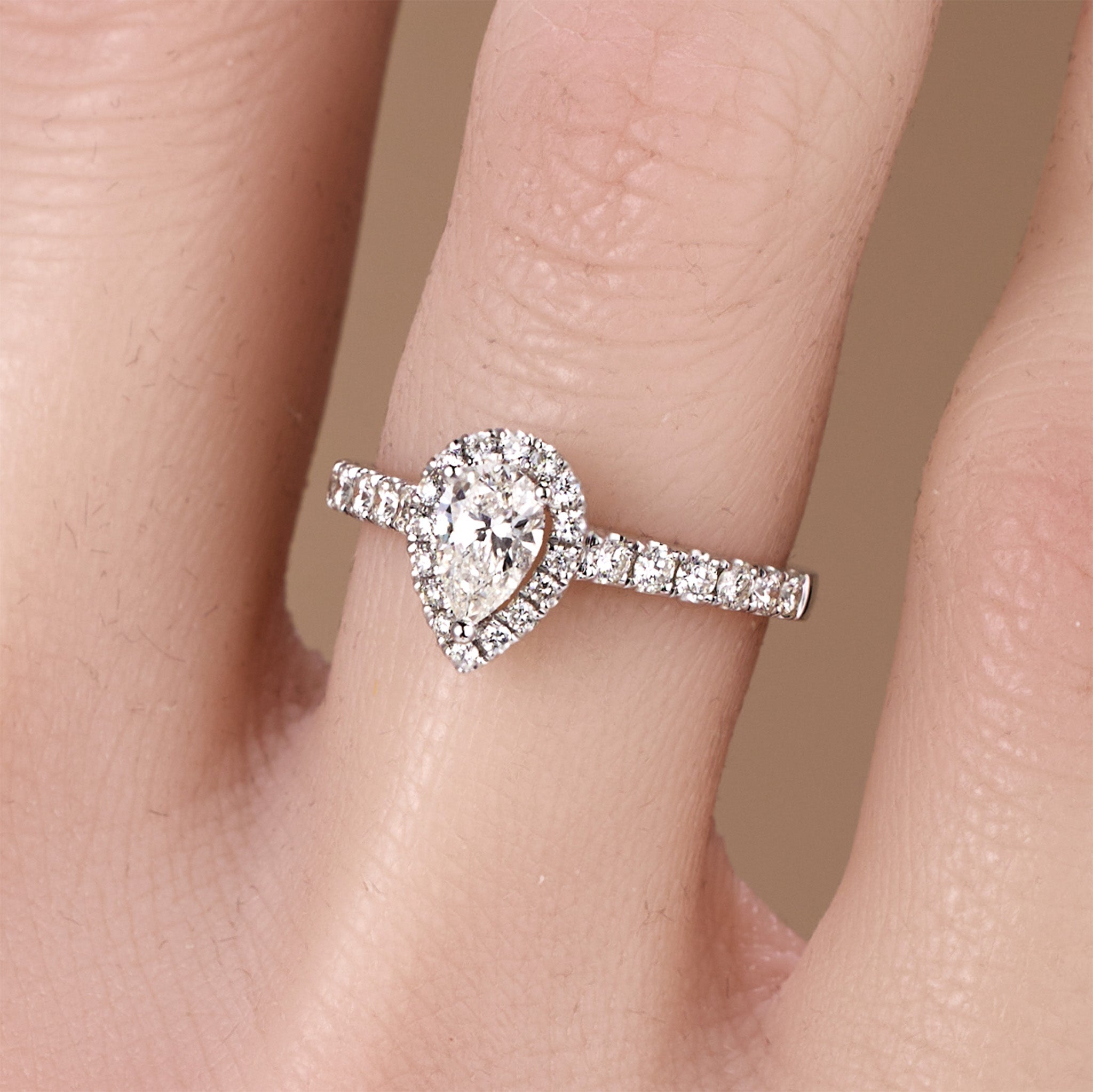 0.93ct.tw. Pear - Shaped Natural Diamond Halo Ring in 18K White Gold - JewelryAndStore