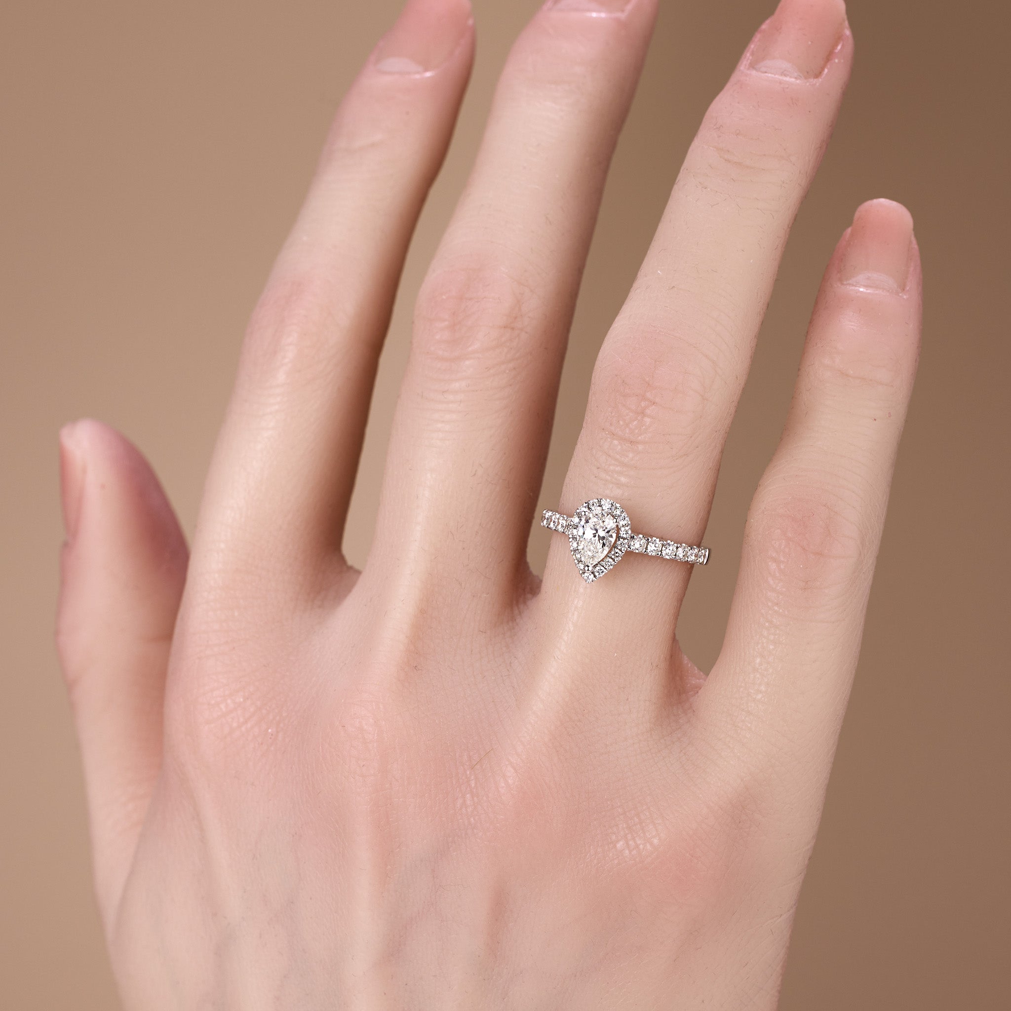 0.93ct.tw. Pear - Shaped Natural Diamond Halo Ring in 18K White Gold - JewelryAndStore