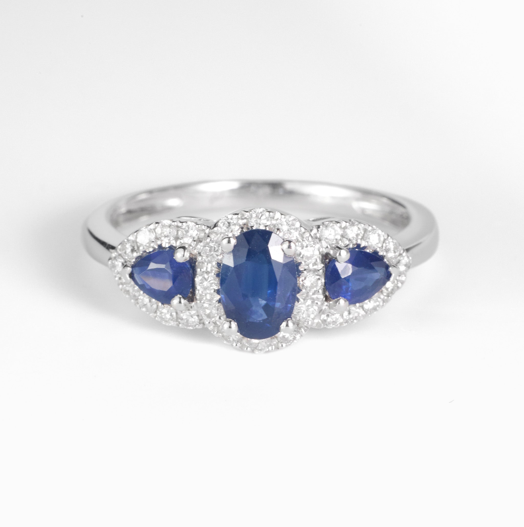 1.03ct.tw. Blue Sapphire and Diamond Three - Stone Ring in 18K Gold - JewelryAndStore