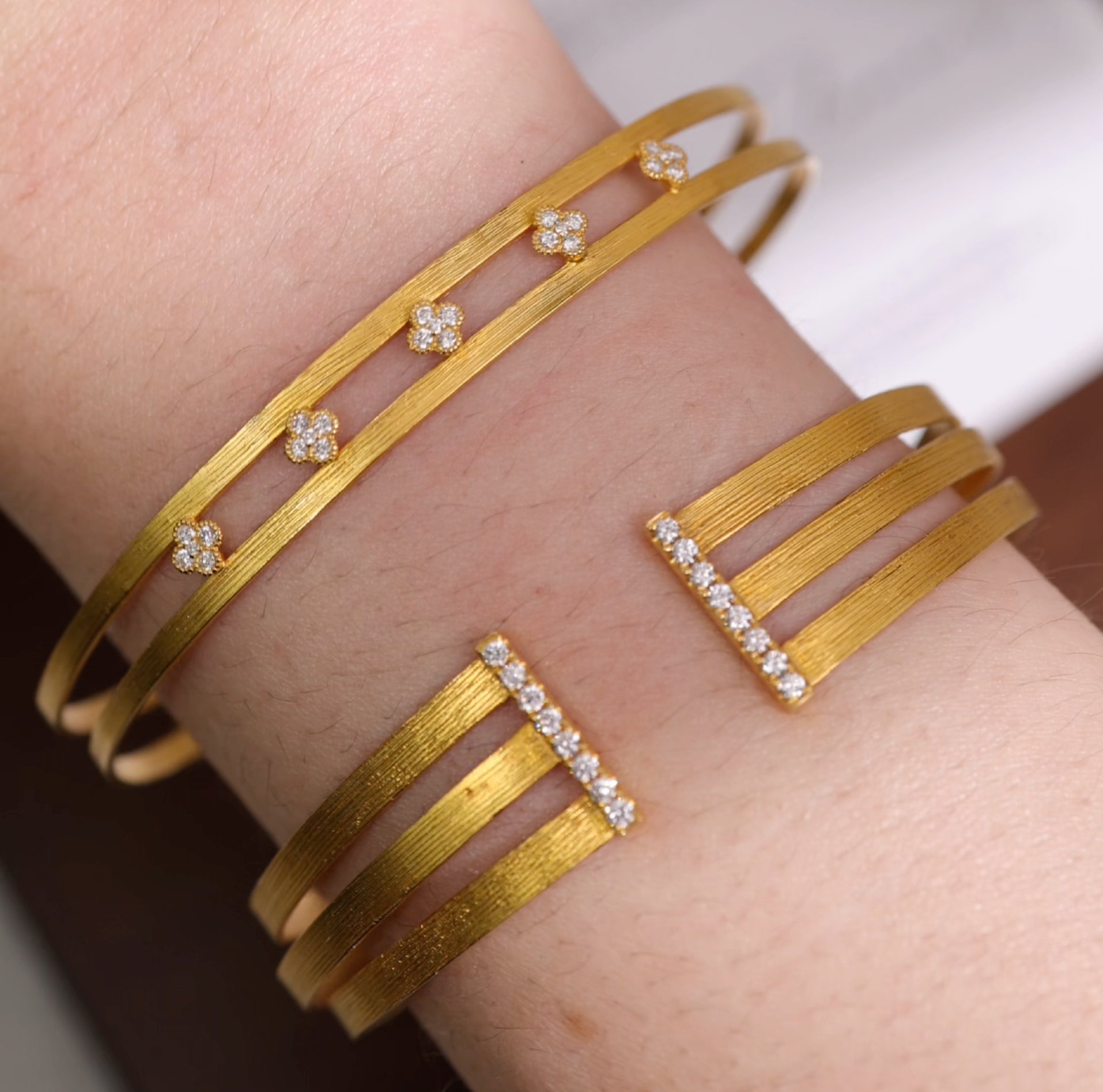 18K Gold Open Cuff Bangle with Diamond Clover Motifs from JewelryandStore