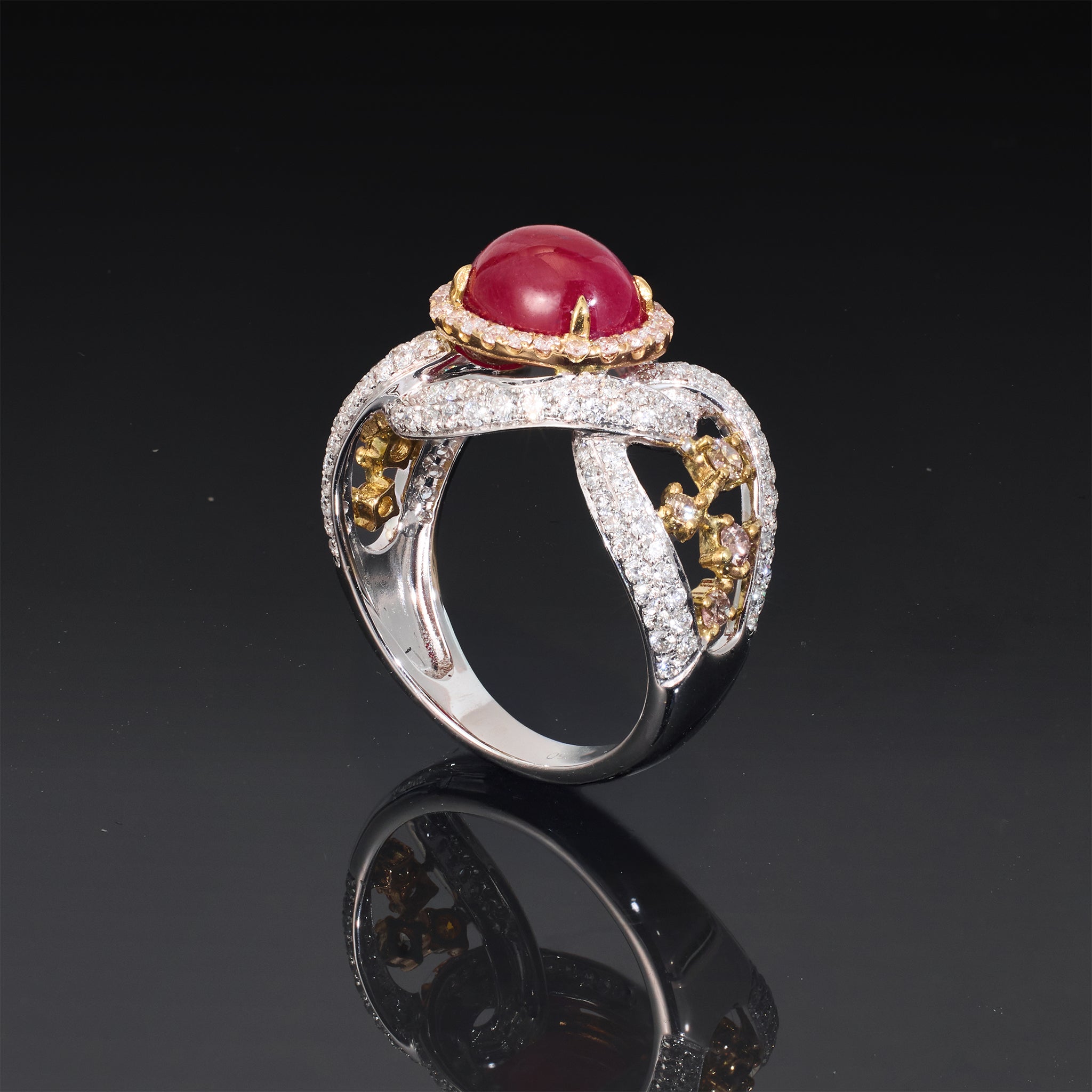 18K White Gold Ring with an Natural Oval Ruby and Fancy Diamonds