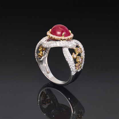 18K White Gold Ring with an Natural Oval Ruby and Fancy Diamonds