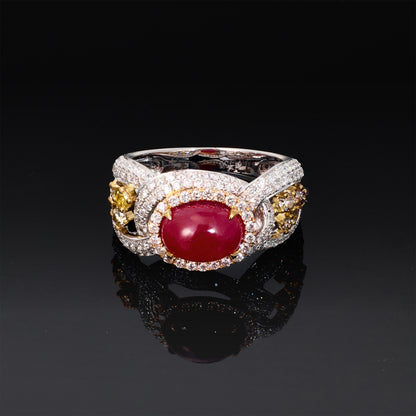 18K White Gold Ring with an Natural Oval Ruby and Fancy Diamonds