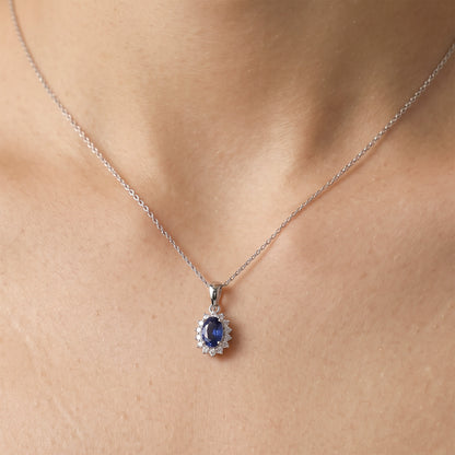 0.62ct Natural Blue Sapphire and Diamond Halo Pendant in 14K White Gold - JewelryAndStore