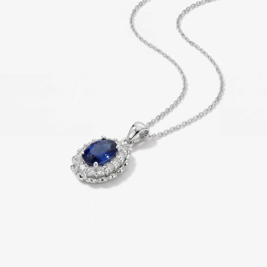 0.55ct Natural Blue Sapphire and Diamond Halo Pendant in 14K White Gold - JewelryAndStore