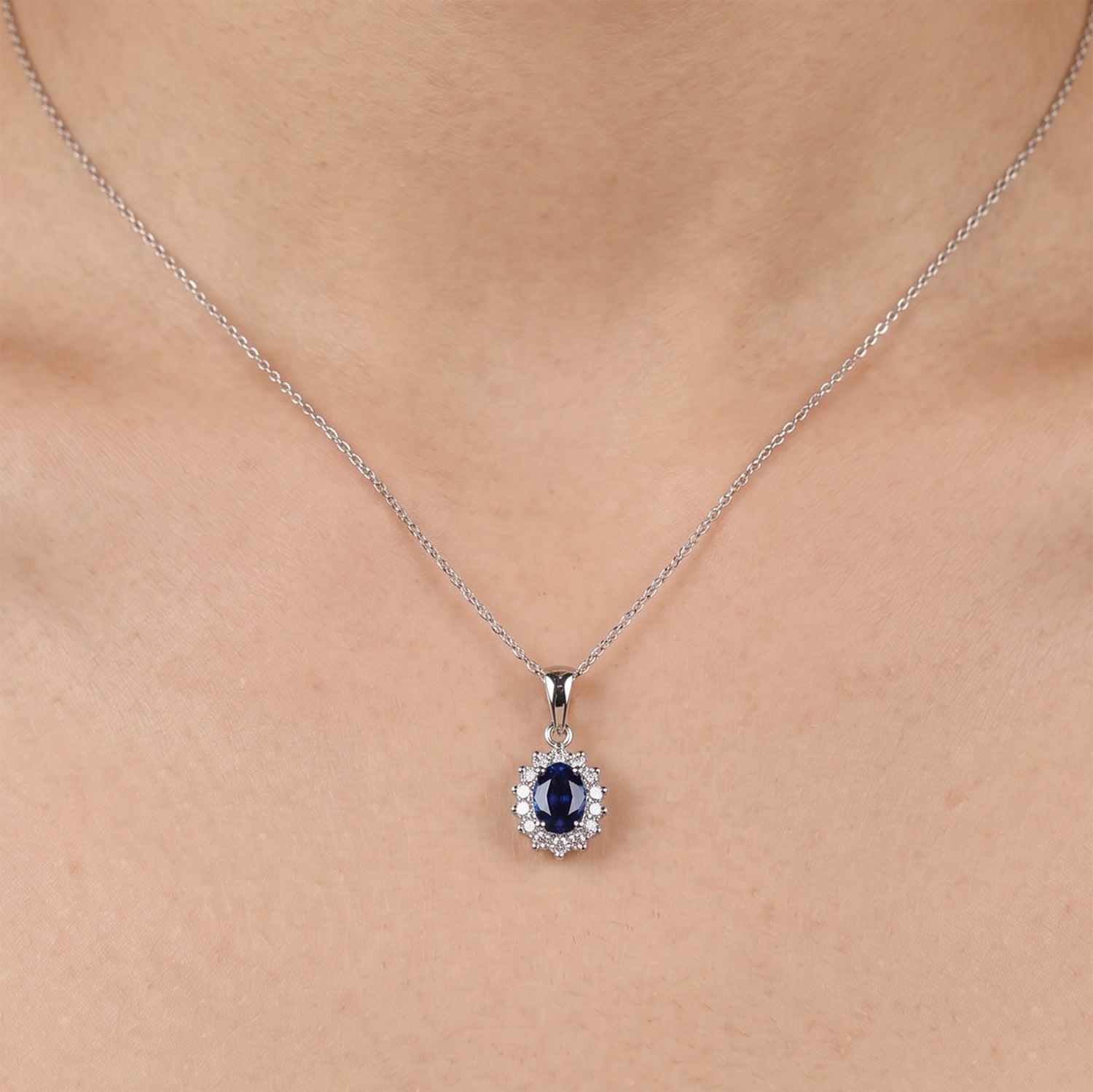 0.55ct Natural Blue Sapphire and Diamond Halo Pendant in 14K White Gold - JewelryAndStore
