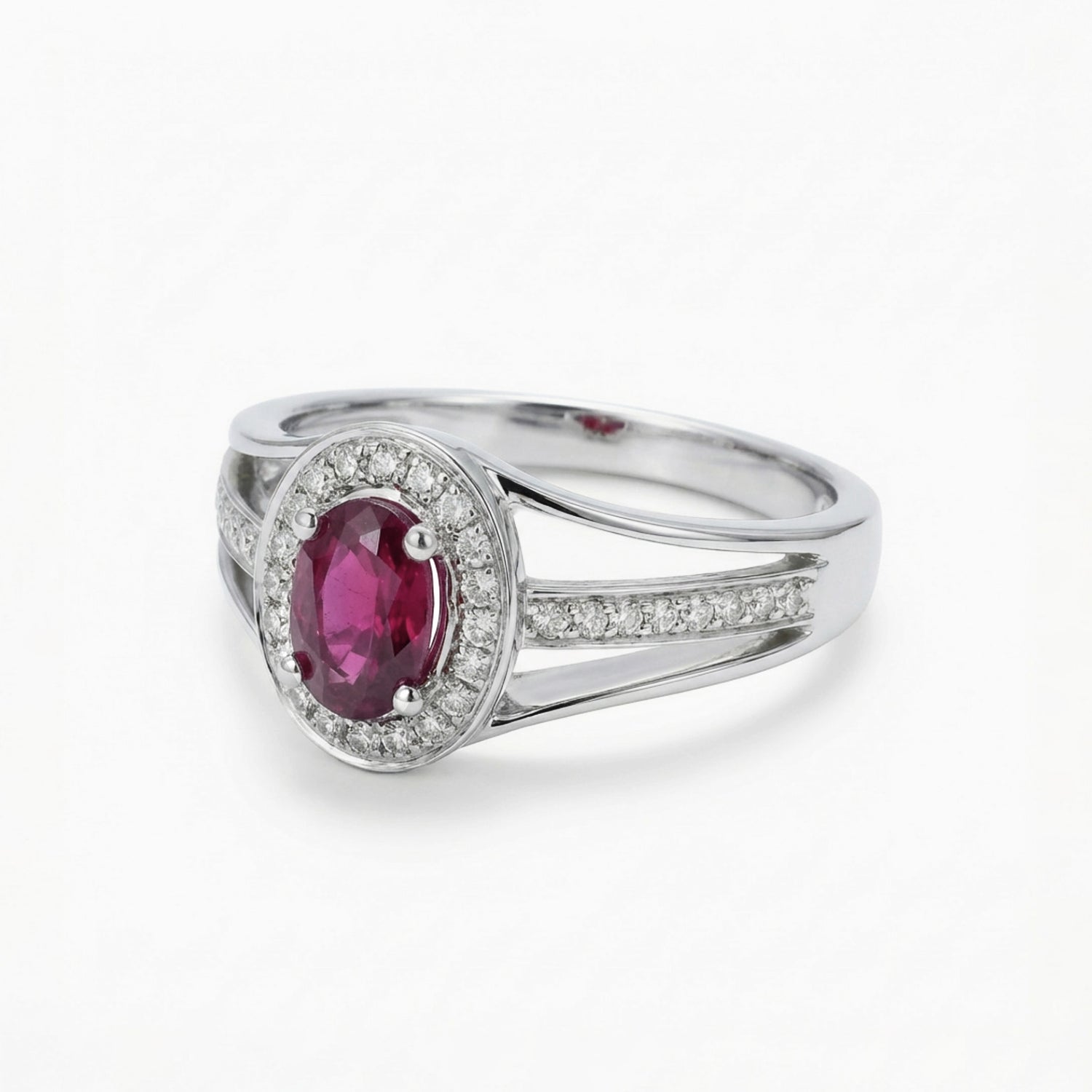0.52ct Oval Ruby and Diamond Halo Ring in 14K White Gold - JewelryAndStore