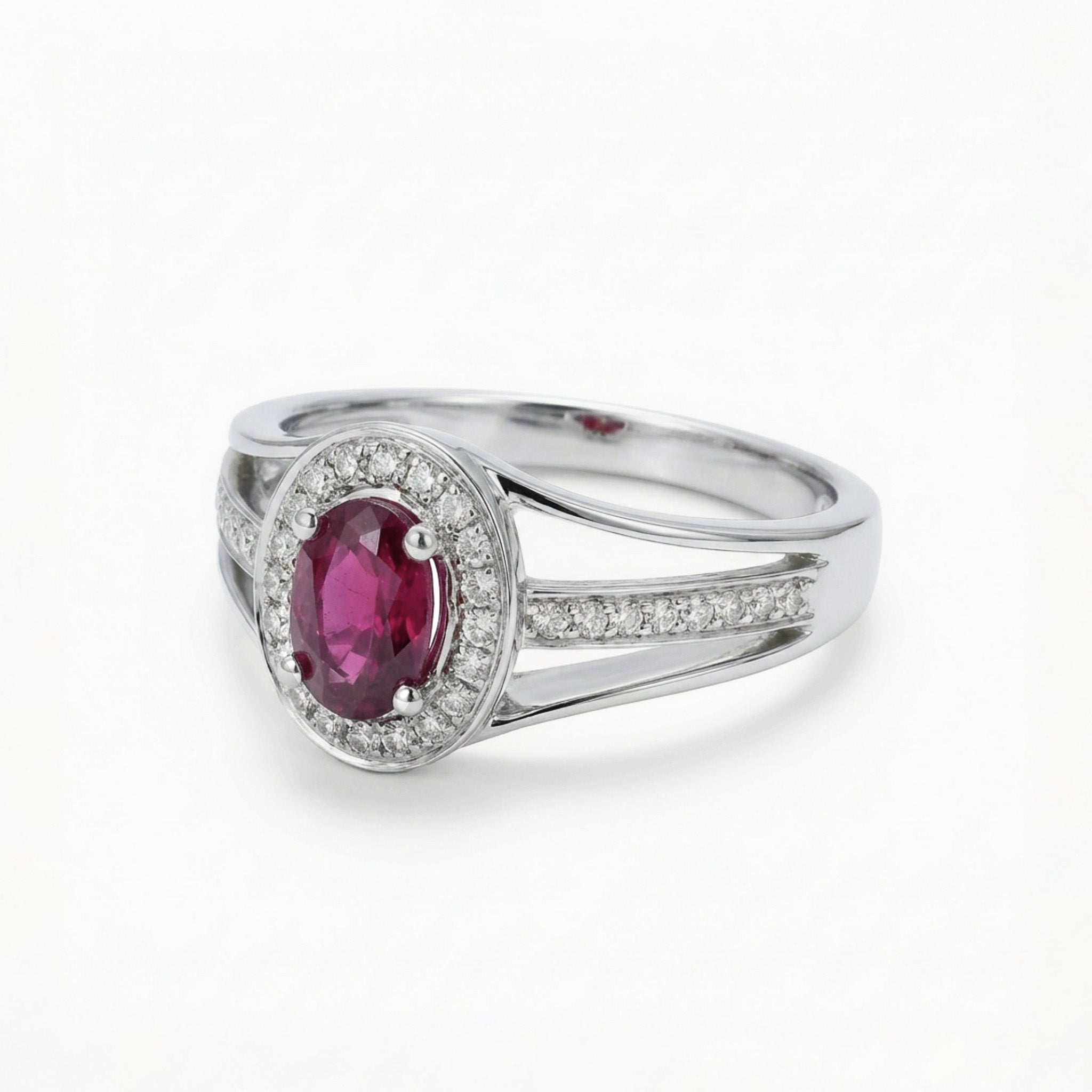 0.52ct Oval Ruby and Diamond Halo Ring in 14K White Gold - JewelryAndStore
