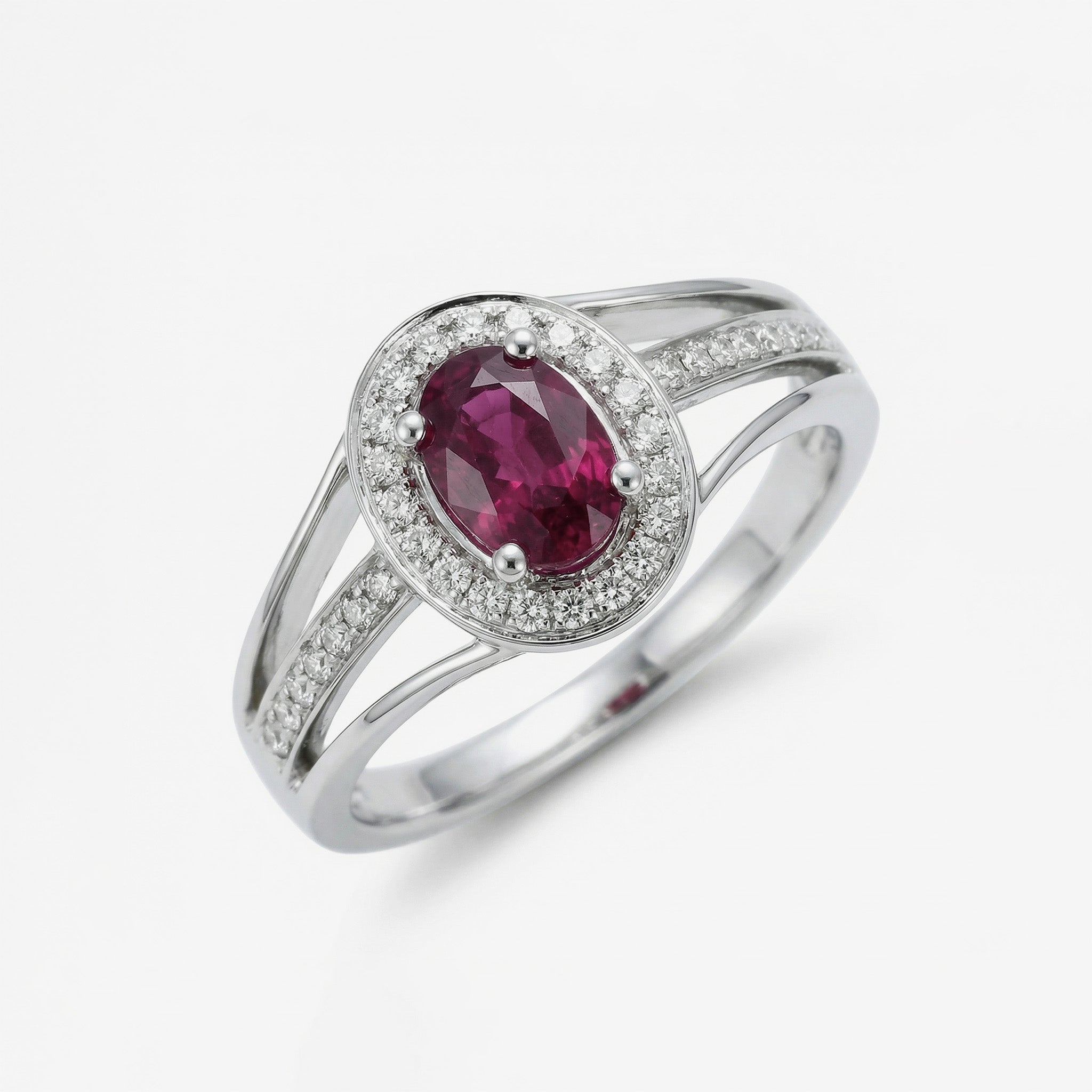 0.52ct Oval Ruby and Diamond Halo Ring in 14K White Gold - JewelryAndStore