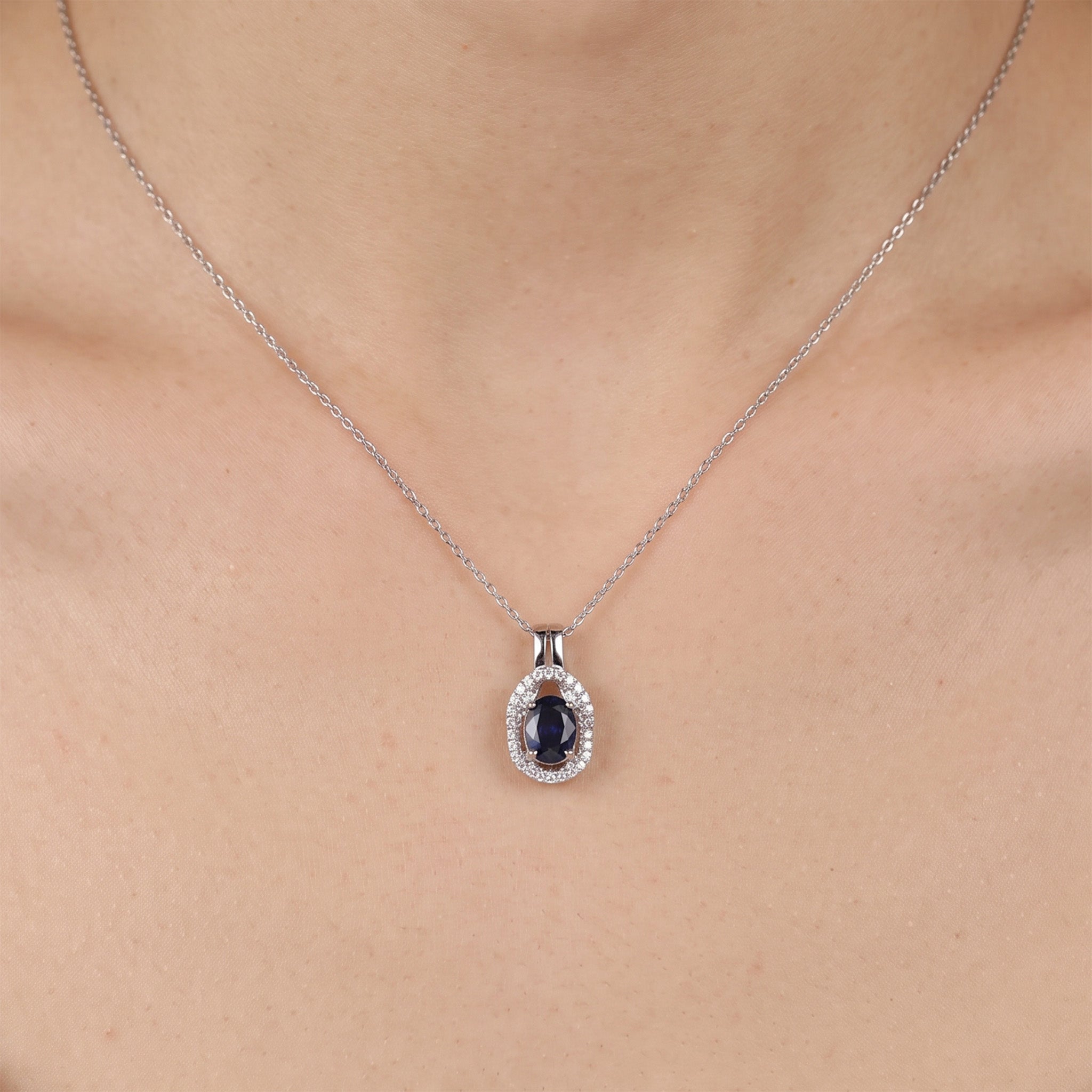 0.81ct Natural Blue Sapphire and Diamond Halo Pendant in 18K White Gold - JewelryAndStore
