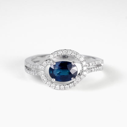 1.09ct Natural Oval Blue Sapphire and Diamond Halo Ring in 18K White Gold - JewelryAndStore