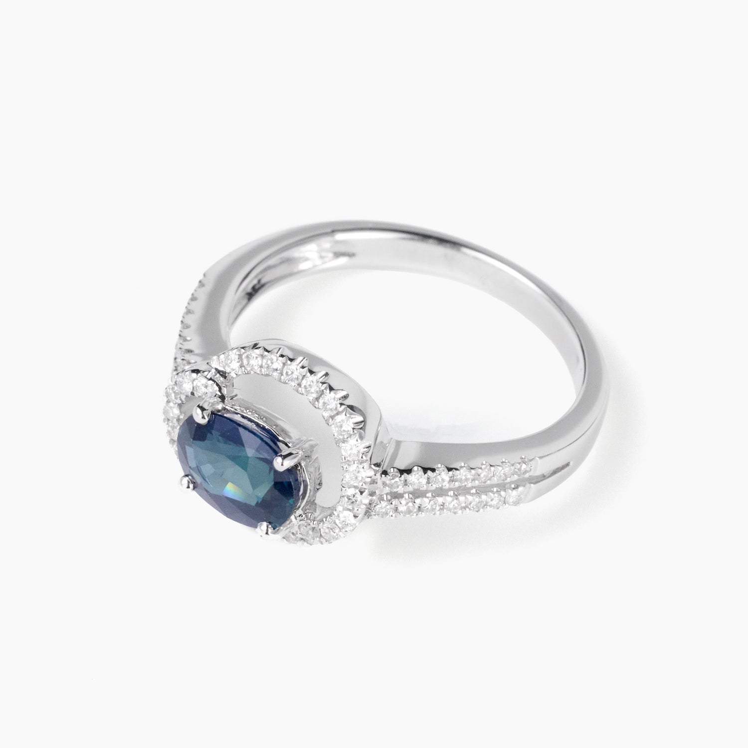 1.09ct Natural Oval Blue Sapphire and Diamond Halo Ring in 18K White Gold - JewelryAndStore