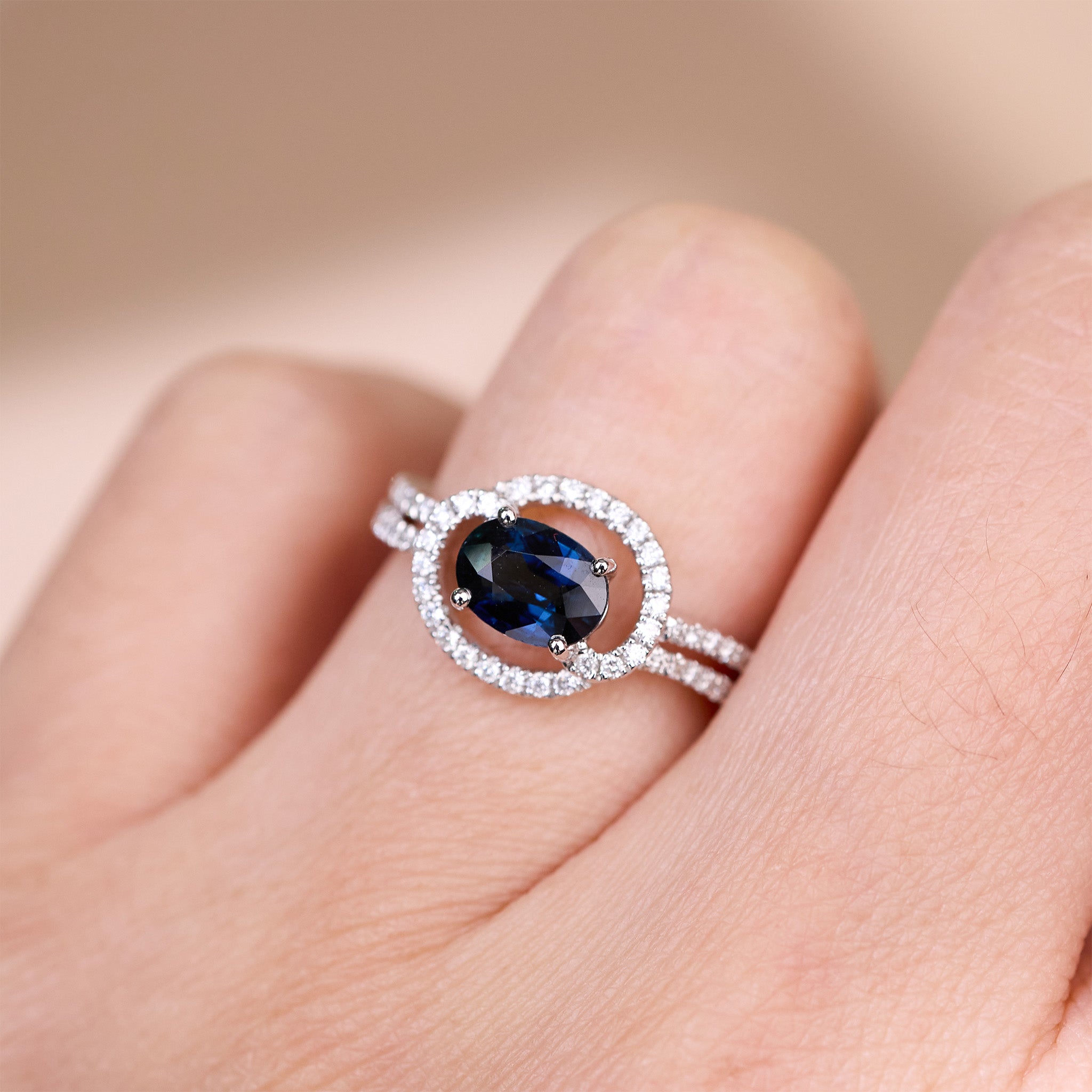1.09ct Natural Oval Blue Sapphire and Diamond Halo Ring in 18K White Gold - JewelryAndStore