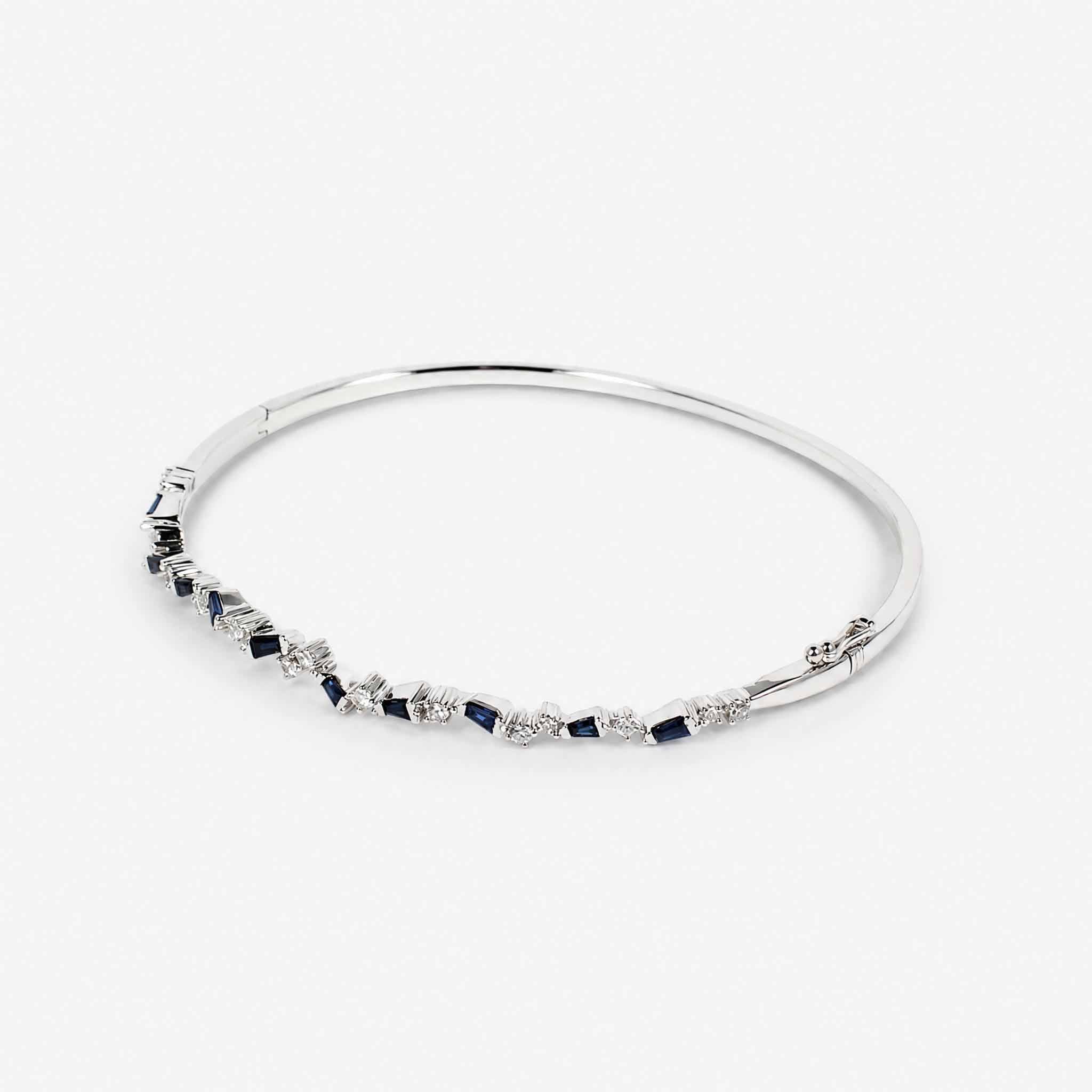 Natural Blue Sapphire and Diamond Asymmetric Wave Cluster Bangle in 18K White Gold - JewelryandStore