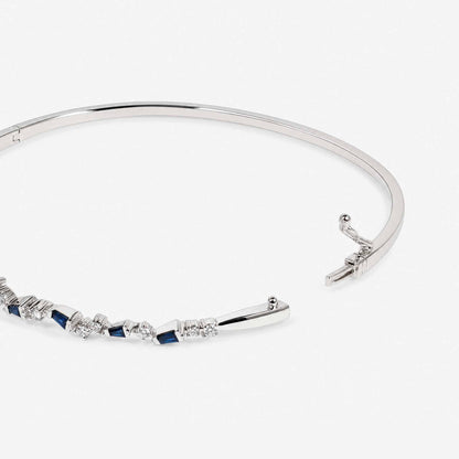 Natural Blue Sapphire and Diamond Asymmetric Wave Cluster Bangle in 18K White Gold - JewelryandStore