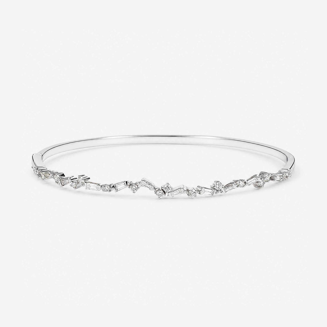 Natural Baguette and Round Diamond Asymmetric Wave Cluster Bangle in 18K White Gold - JewelryAndStore