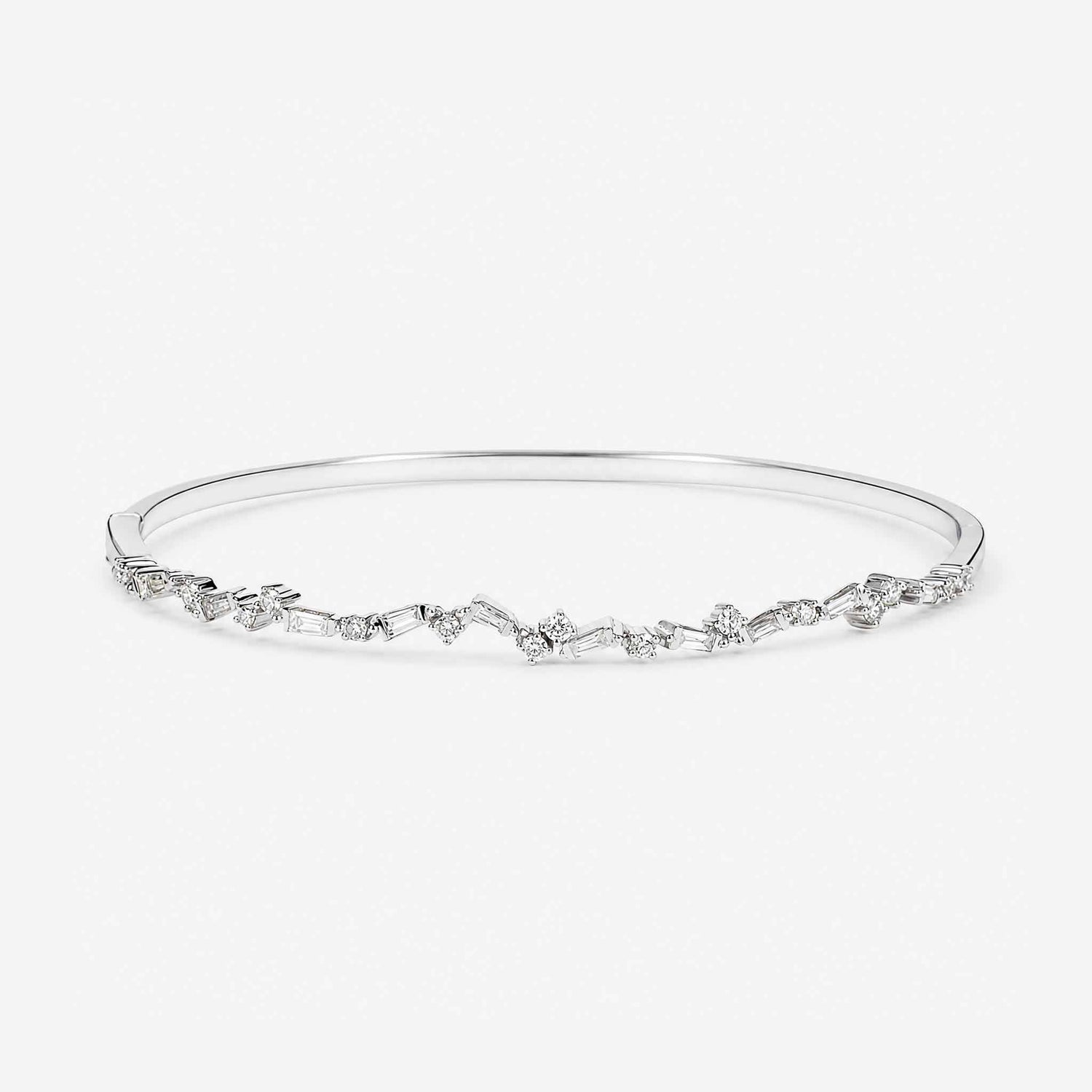 Natural Baguette and Round Diamond Asymmetric Wave Cluster Bangle in 18K White Gold - JewelryAndStore