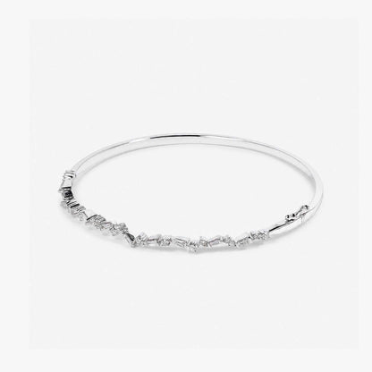 Natural Baguette and Round Diamond Asymmetric Wave Cluster Bangle in 18K White Gold - JewelryAndStore