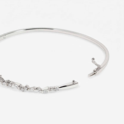 Natural Baguette and Round Diamond Asymmetric Wave Cluster Bangle in 18K White Gold - JewelryAndStore