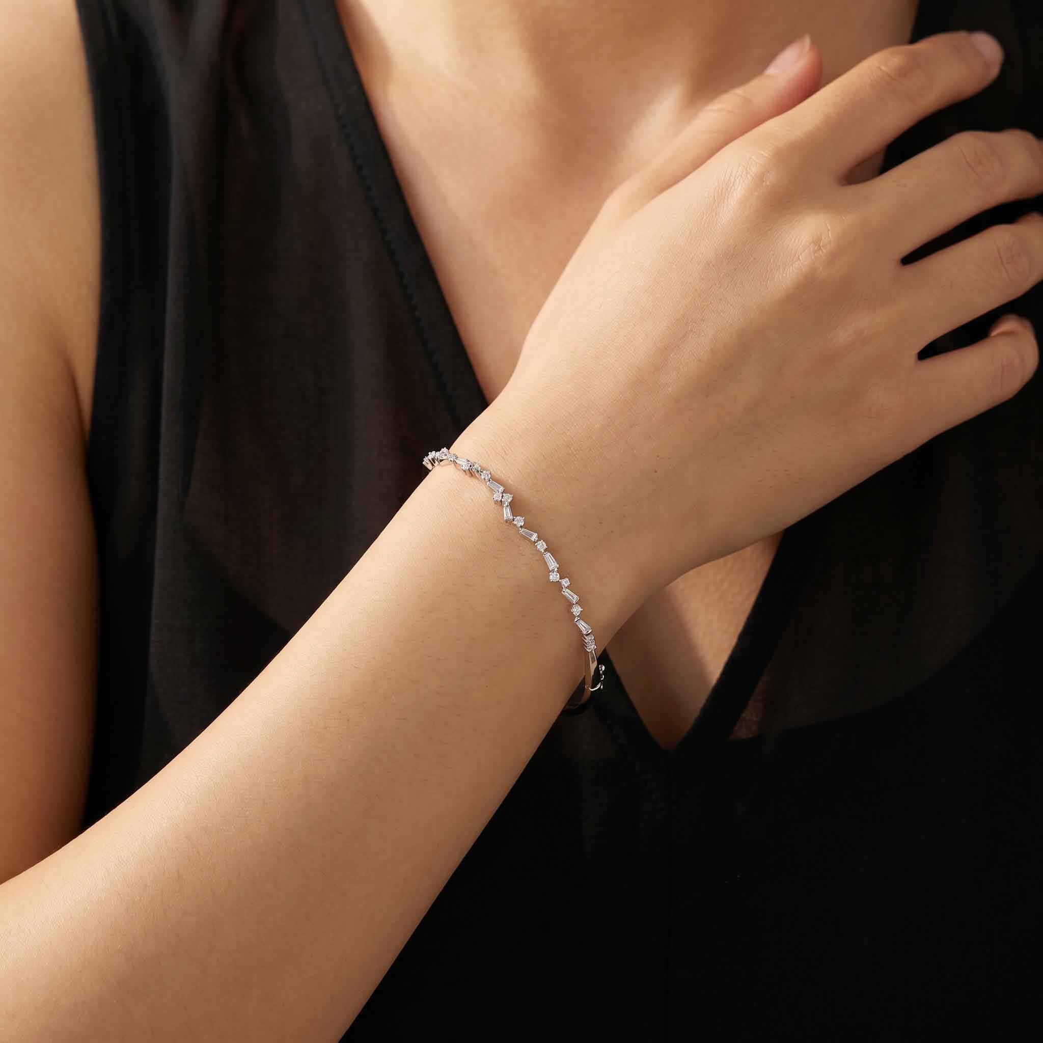 Natural Baguette and Round Diamond Asymmetric Wave Cluster Bangle in 18K White Gold - JewelryAndStore