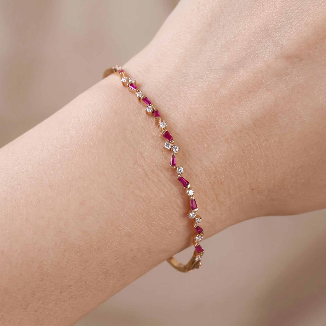 Natural Ruby and Diamond Asymmetric Wave Bangle in 18K Rose Gold - JewelryAndStore