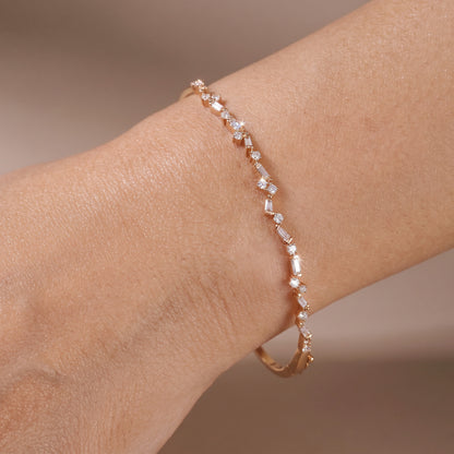 Natural Baguette and Round Diamond Asymmetric Wave Bangle in 18K Rose Gold - JewelryAndStore