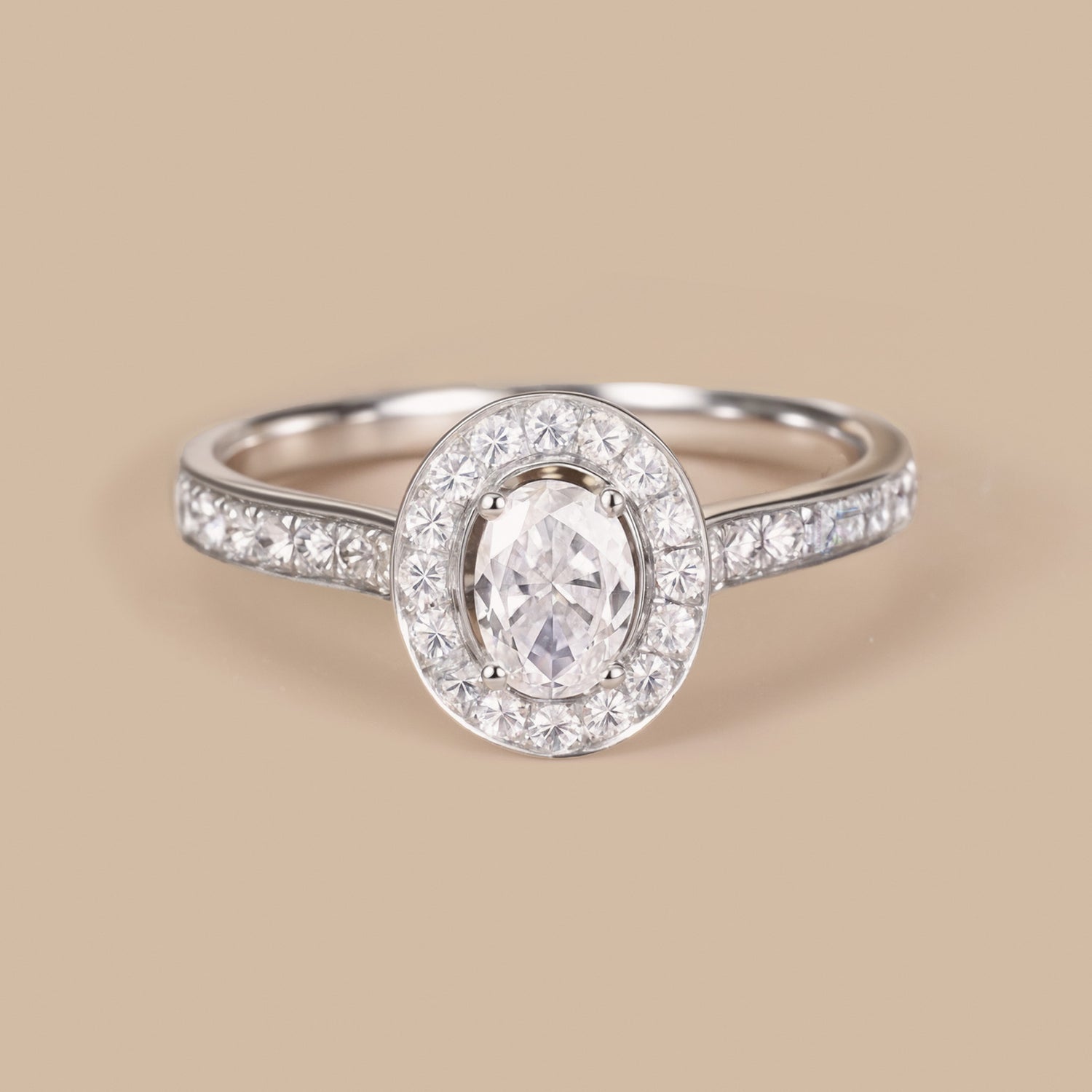 0.69ct.tw. Oval Diamond Halo Engagement Ring in 18K White Gold