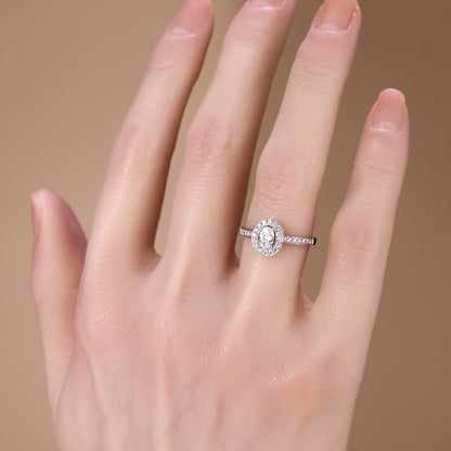 0.69ct.tw. Oval Diamond Halo Engagement Ring in 18K White Gold - JewelryAndStore