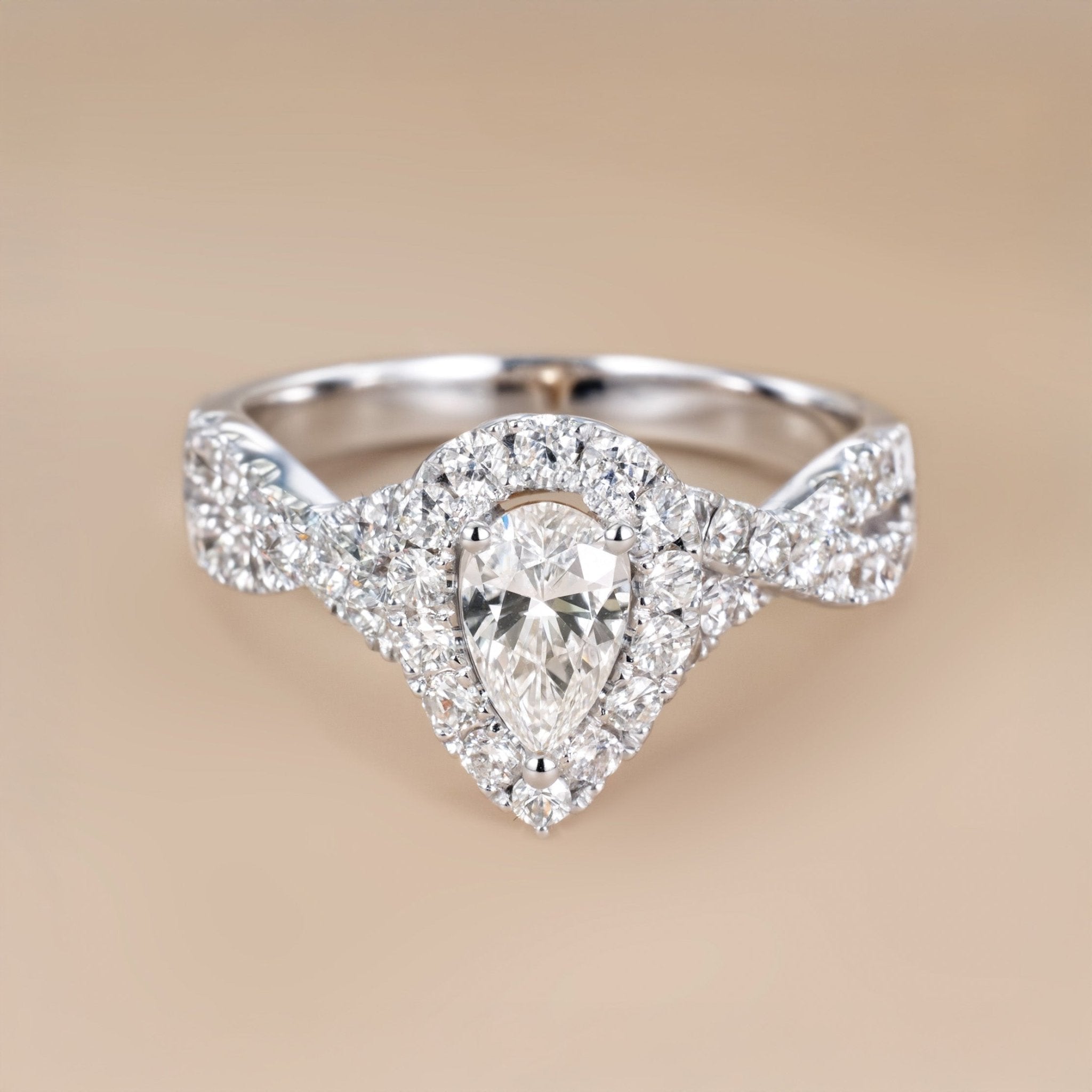1.22ct.tw. Pear-Shaped Diamond Split Shank Engagement Ring in 18K White Gold