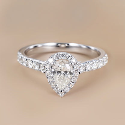 0.93ct.tw. Pear-Shaped Diamond Halo Ring in 18K White Gold