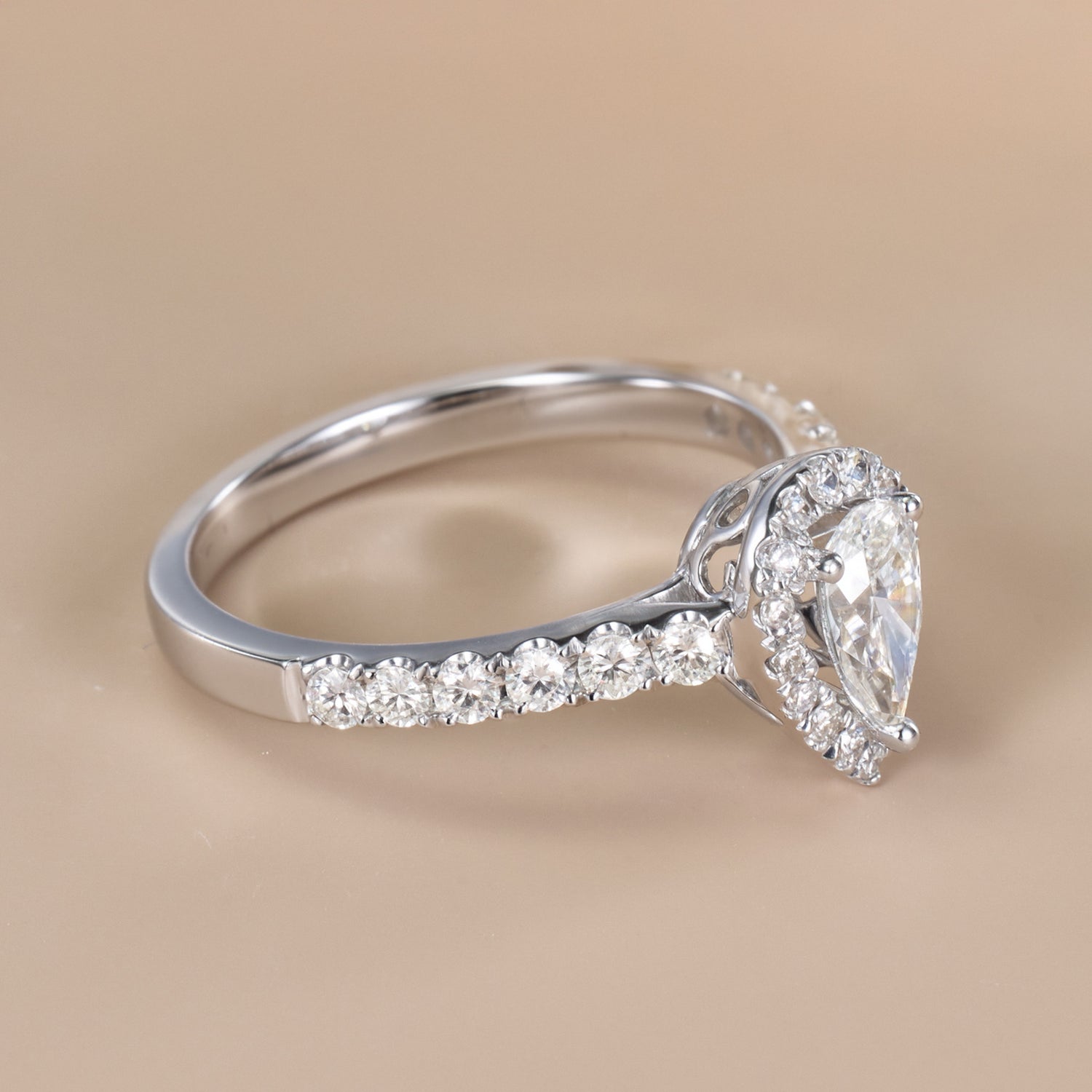 0.93ct.tw. Pear-Shaped Diamond Halo Ring in 18K White Gold