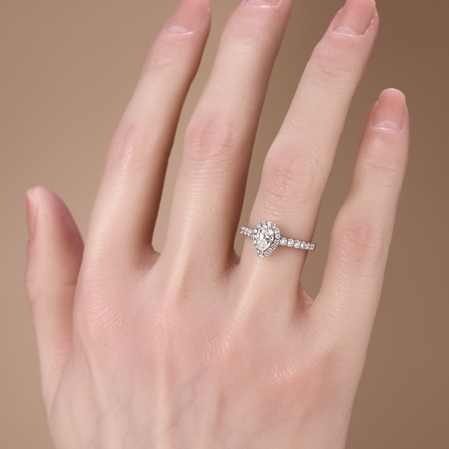 0.93ct.tw. Pear-Shaped Diamond Halo Ring in 18K White Gold