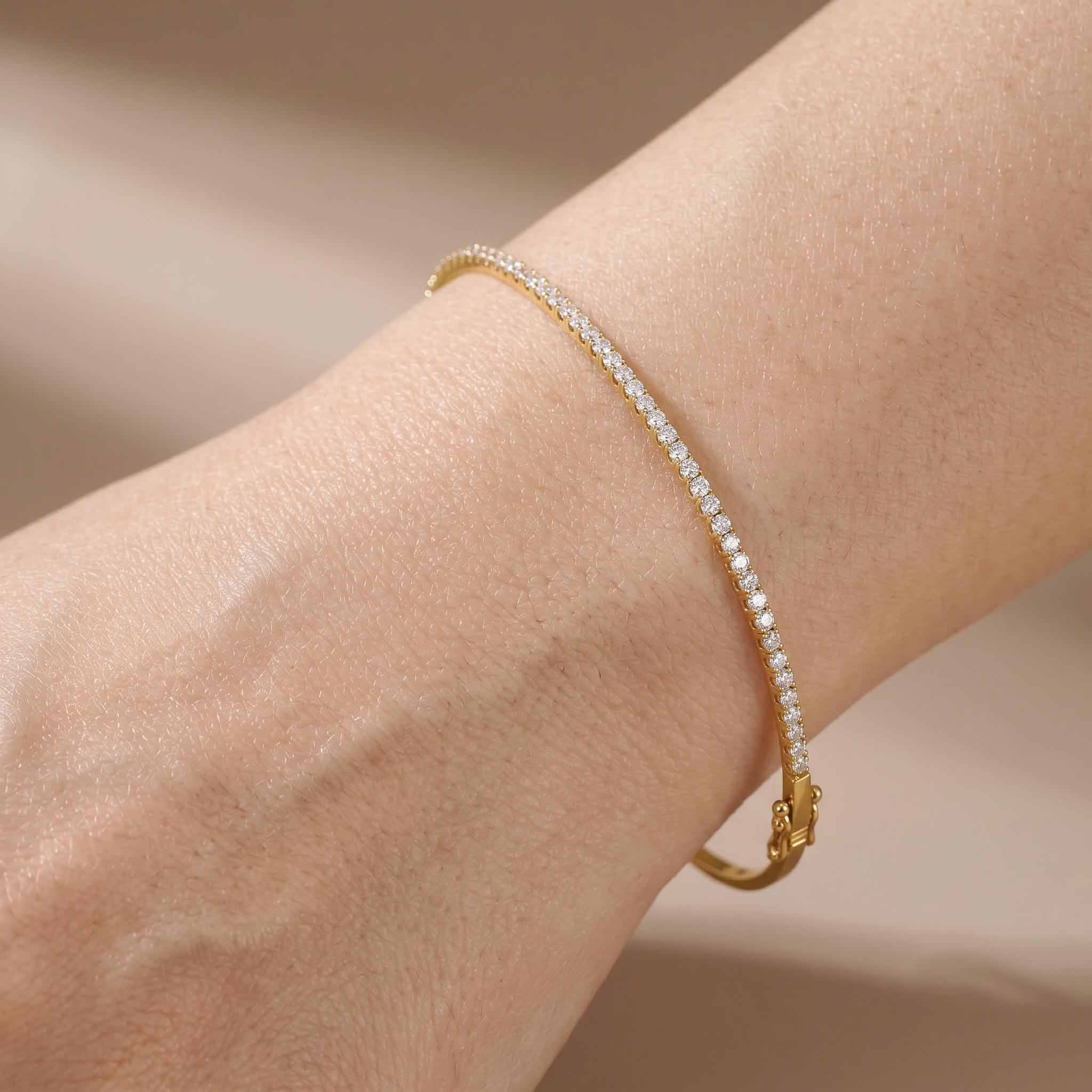 Classic Single Row Diamond Tennis Bangle in 18K Yellow Gold - JewelryAndStore