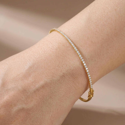 Classic Single Row Diamond Tennis Bangle in 18K Yellow Gold - JewelryAndStore