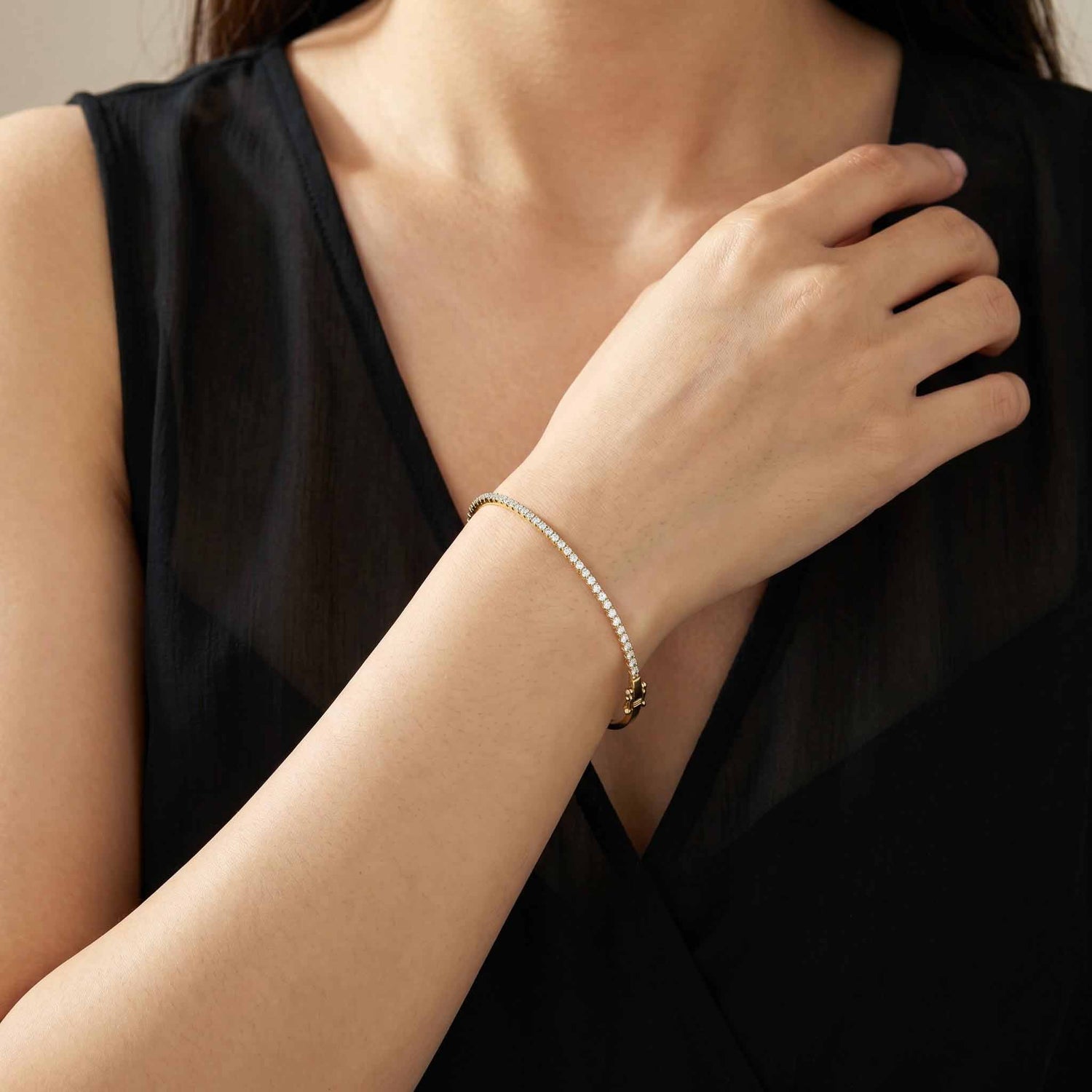 Classic Single Row Diamond Tennis Bangle in 18K Yellow Gold - JewelryAndStore