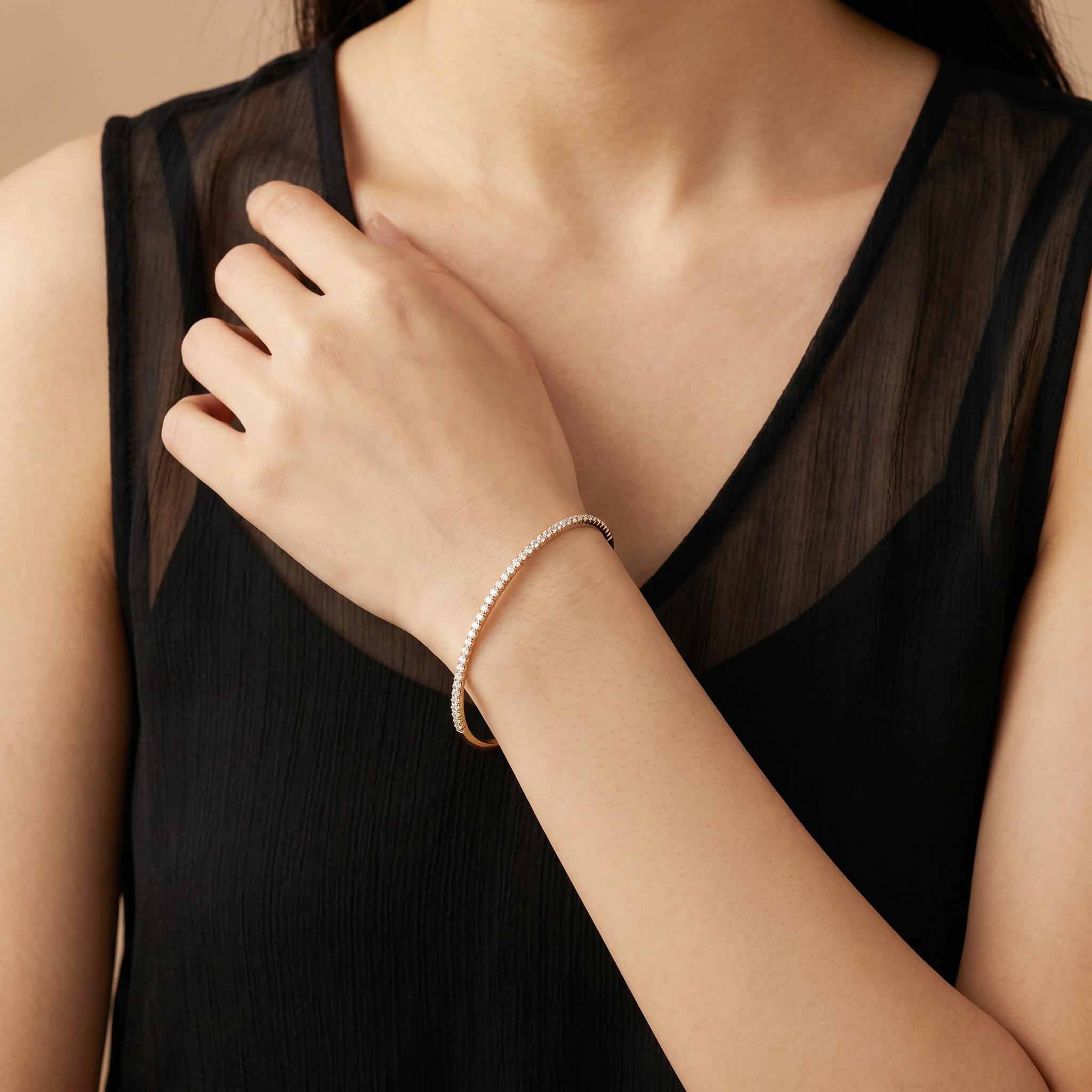 Classic Single Row Diamond Tennis Bangle in 18K Rose Gold - JewelryAndStore