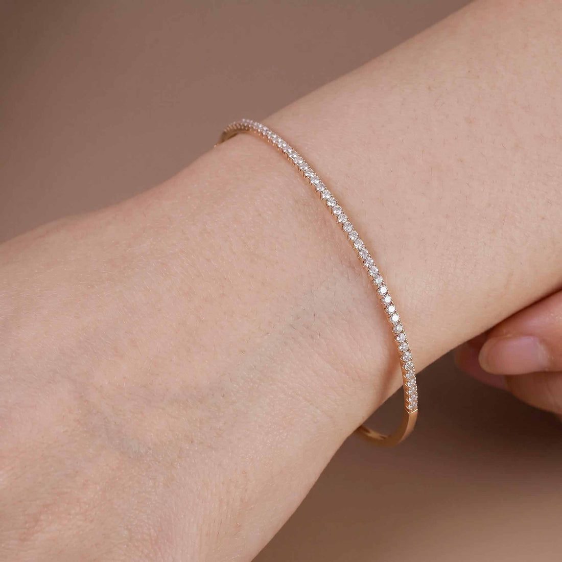 Classic Single Row Diamond Tennis Bangle in 18K Rose Gold - JewelryAndStore