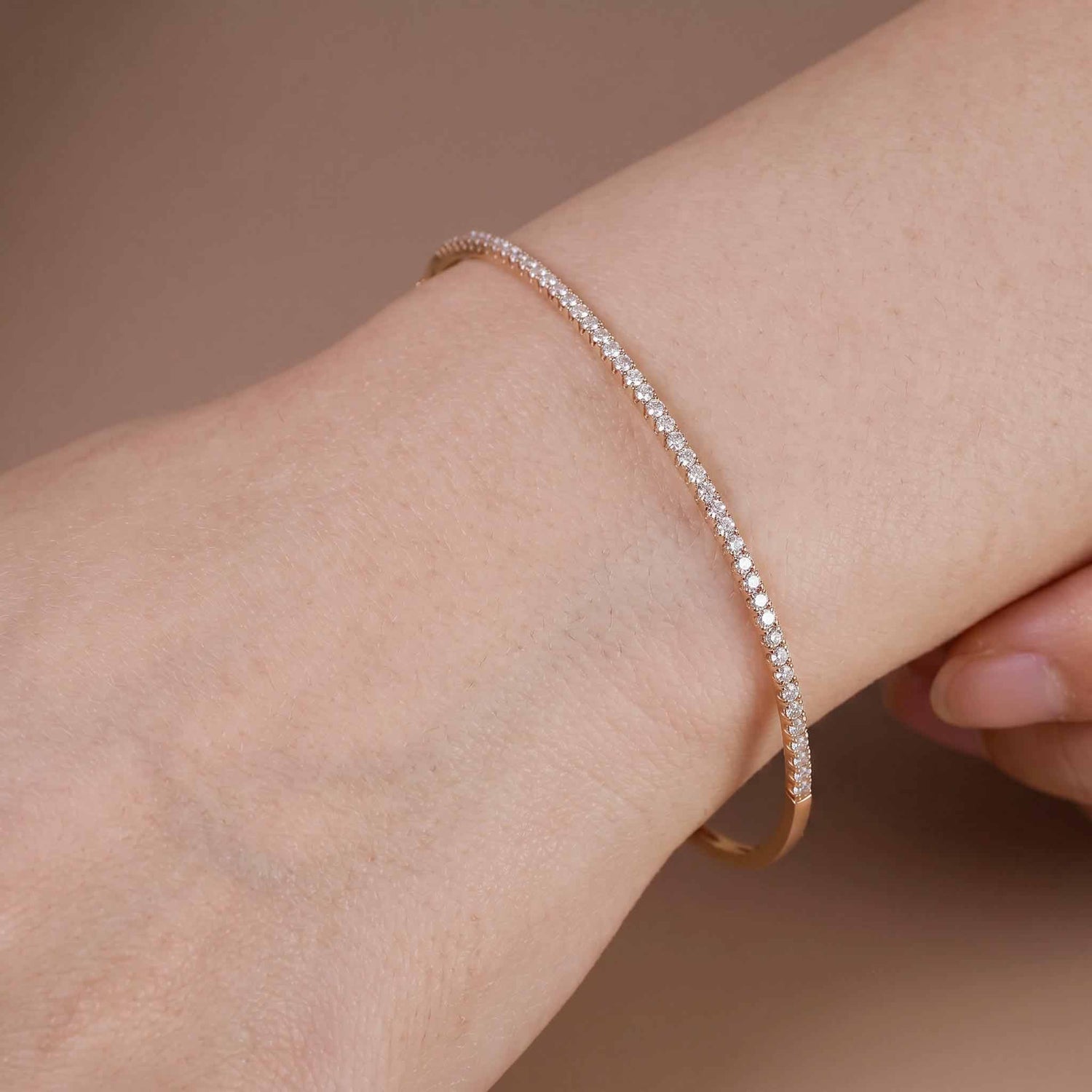 Classic Single Row Diamond Tennis Bangle in 18K Rose Gold - JewelryAndStore