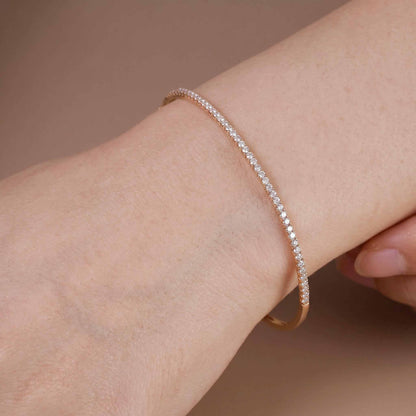 Classic Single Row Diamond Tennis Bangle in 18K Rose Gold - JewelryAndStore