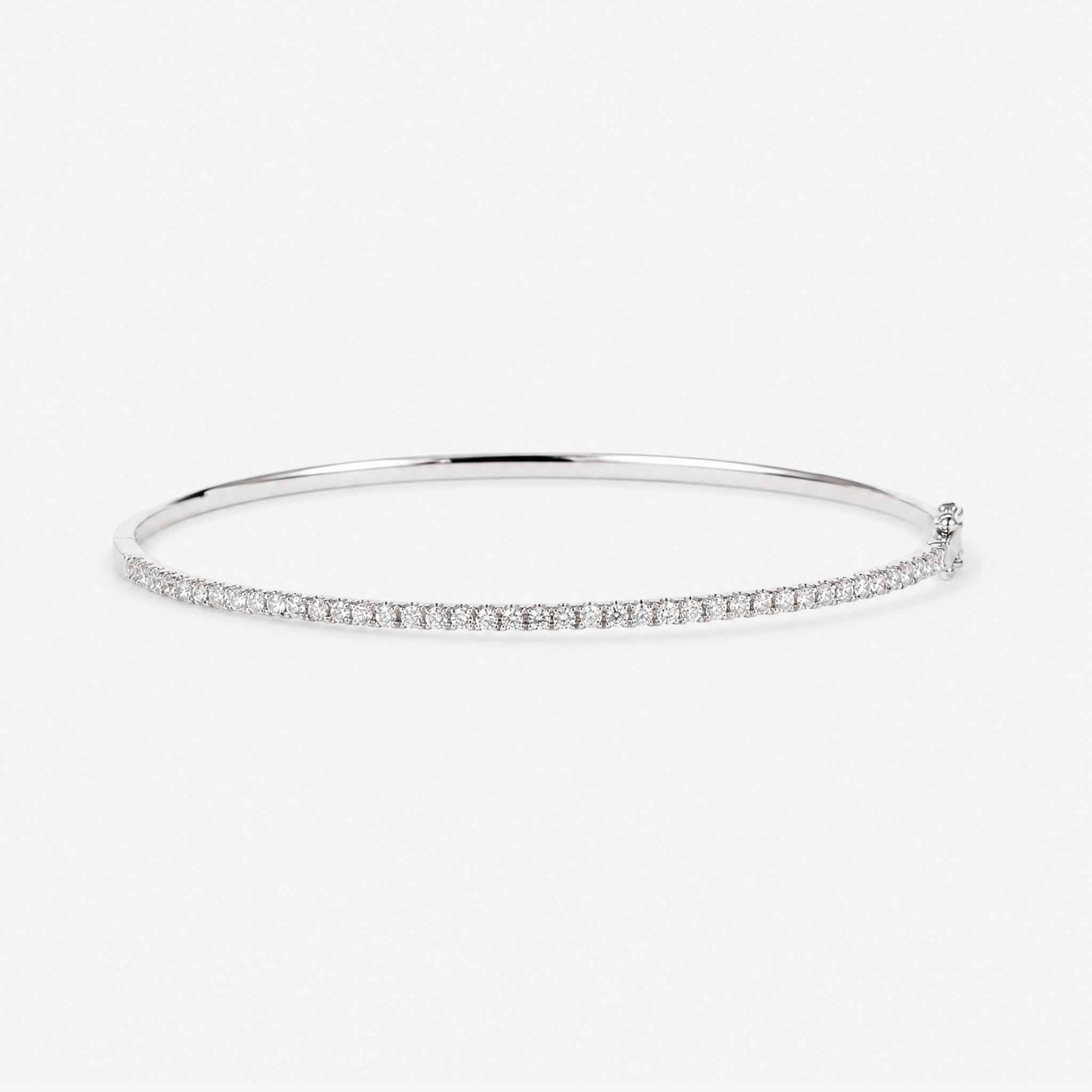 Minimalist Single Row Diamond Tennis Bangle in 18K White Gold - JewelryAndStore