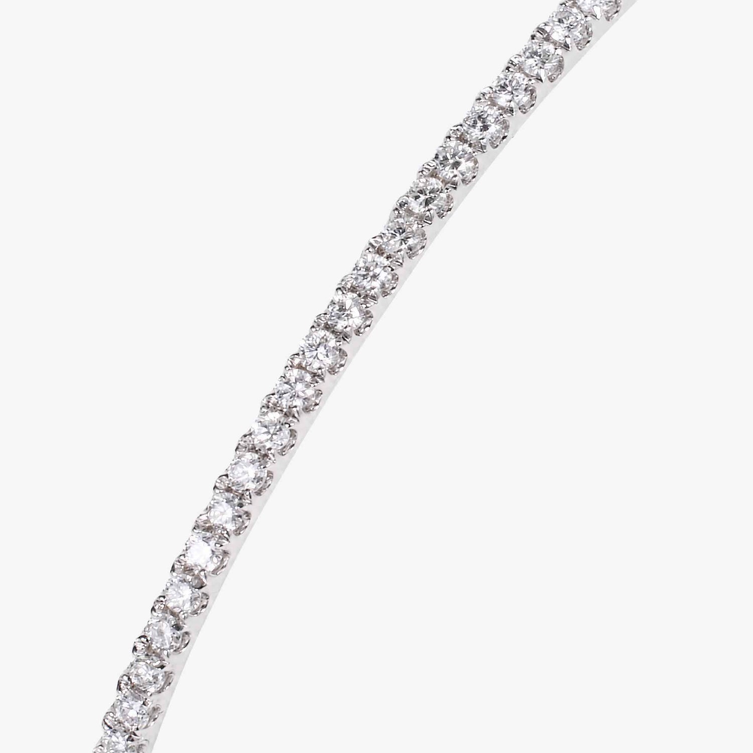 Minimalist Single Row Diamond Tennis Bangle in 18K White Gold - JewelryAndStore