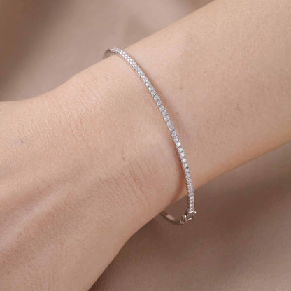 Minimalist Single Row Diamond Tennis Bangle in 18K White Gold - JewelryAndStore