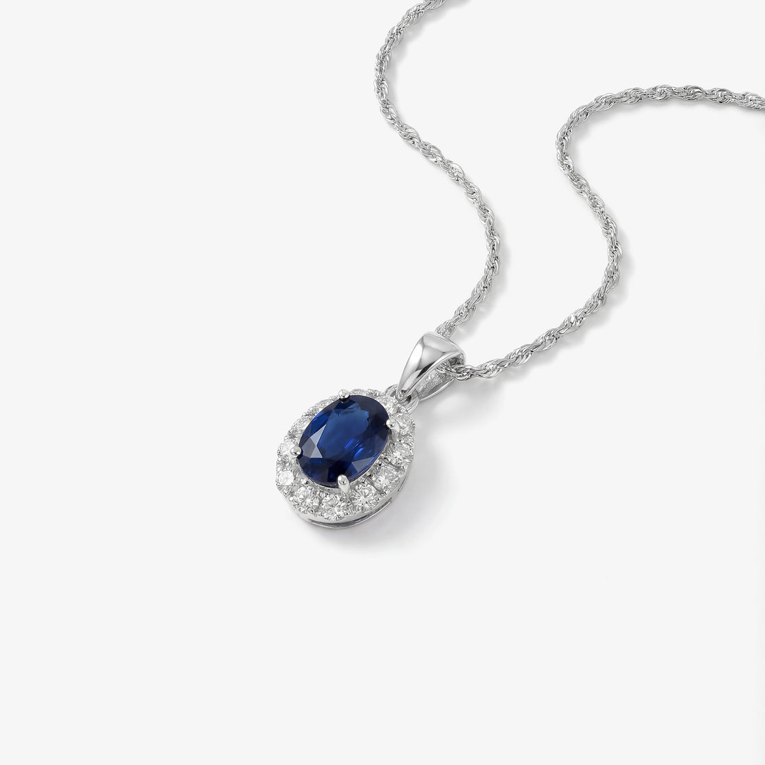 1.09ct Natural Blue Sapphire and Diamond Halo Pendant in 18K White Gold - JewelryAndStore