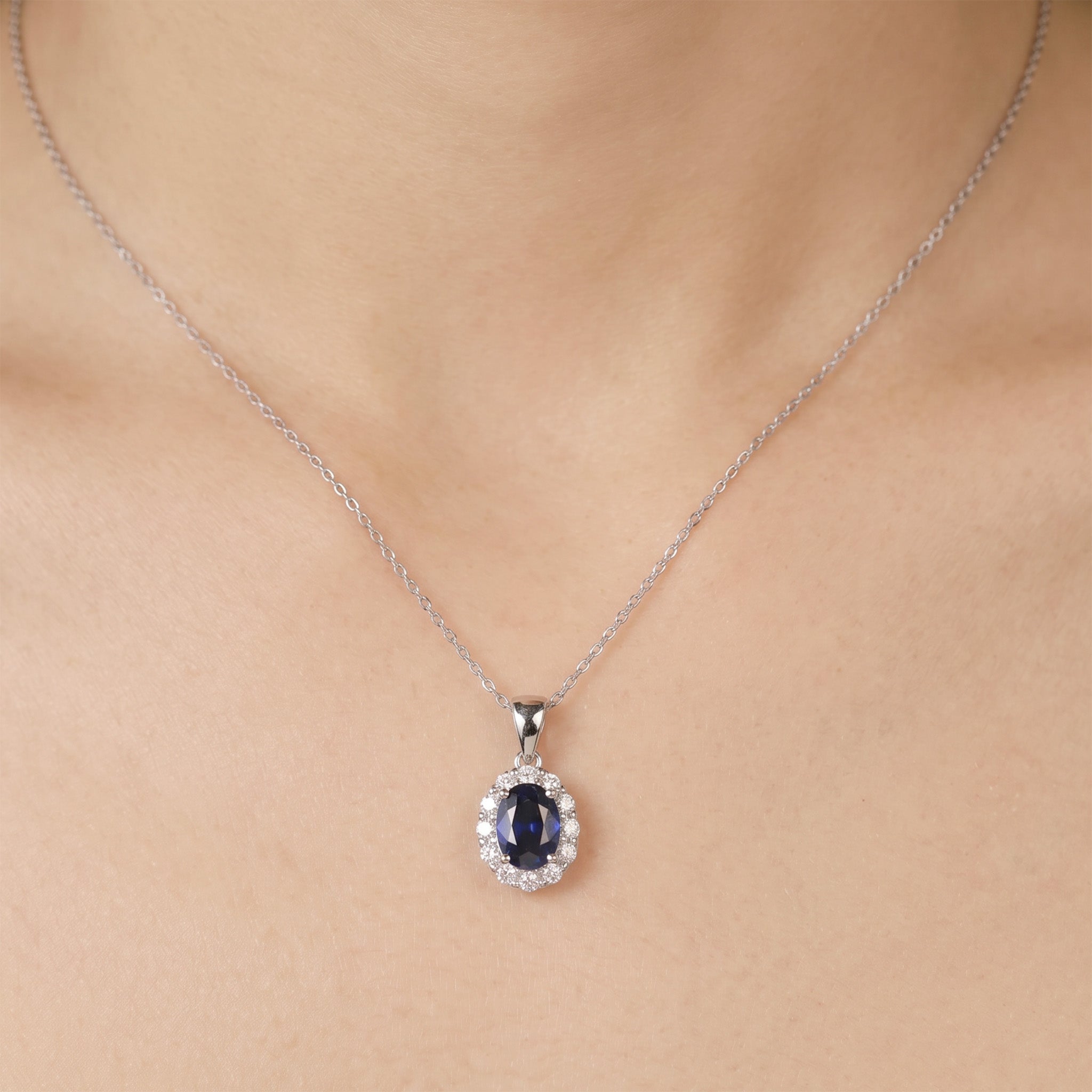 1.09ct Natural Blue Sapphire and Diamond Halo Pendant in 18K White Gold - JewelryAndStore