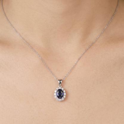 1.09ct Natural Blue Sapphire and Diamond Halo Pendant in 18K White Gold - JewelryAndStore