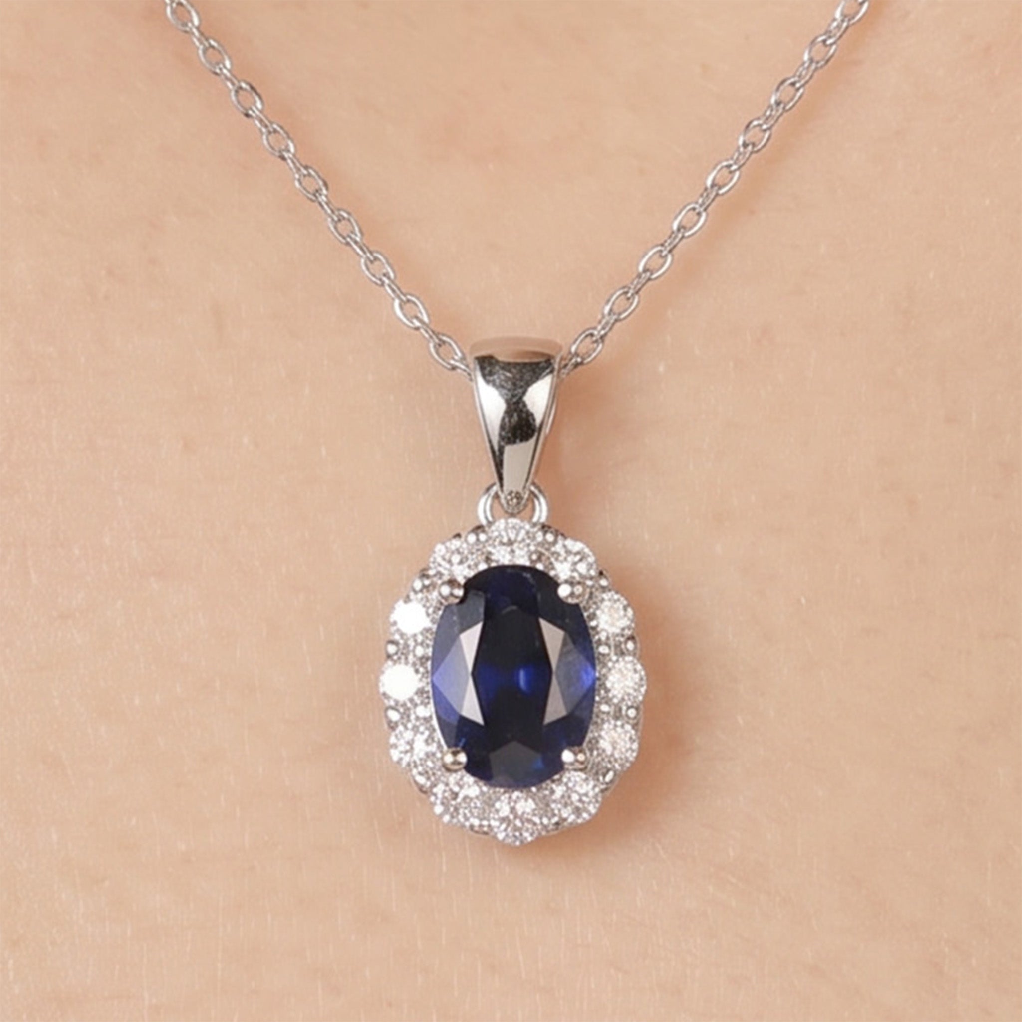 1.09ct Natural Blue Sapphire and Diamond Halo Pendant in 18K White Gold - JewelryAndStore